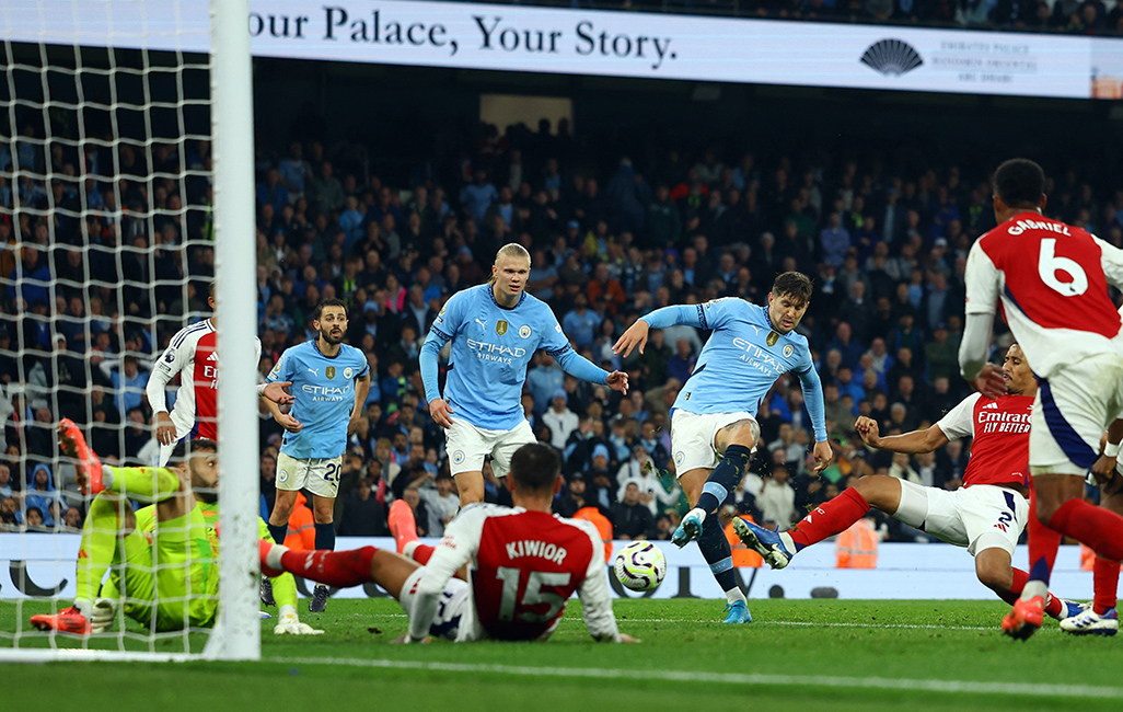 image Man City rescue late draw against 10-man Arsenal