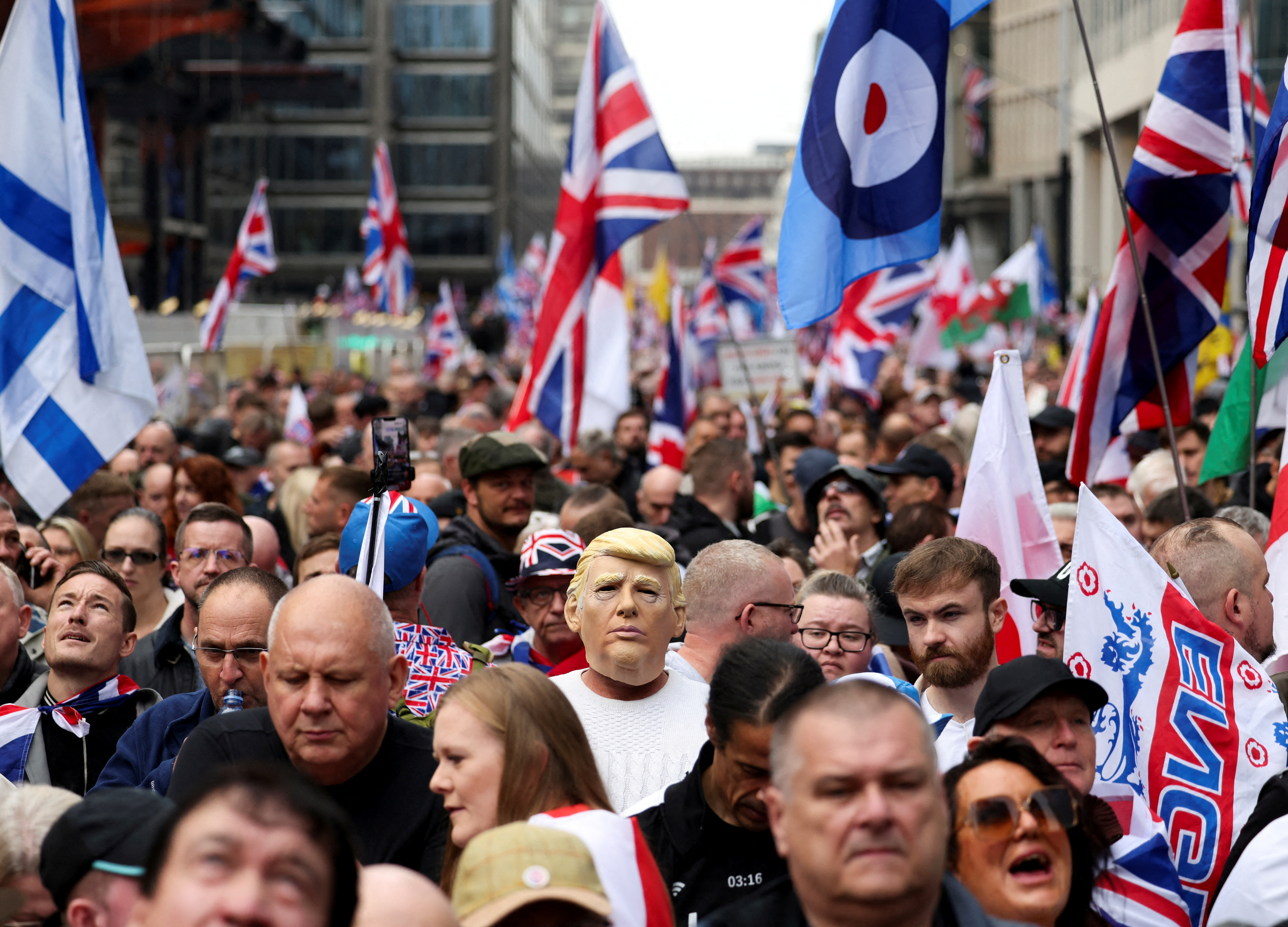 image Heavy police presence as rival London marches begin