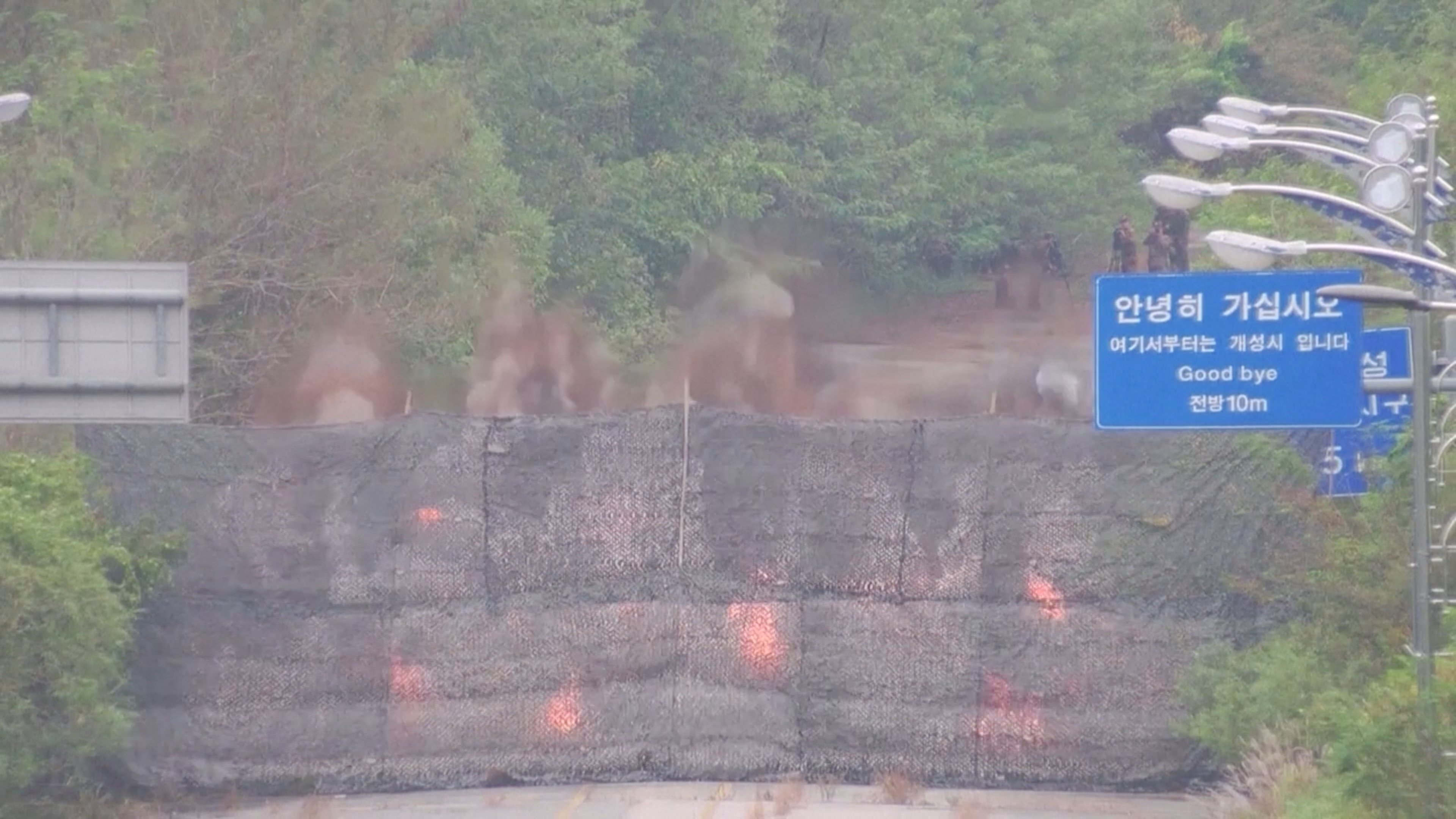 image North Korea blows up parts of inter-Korean road on its side of border