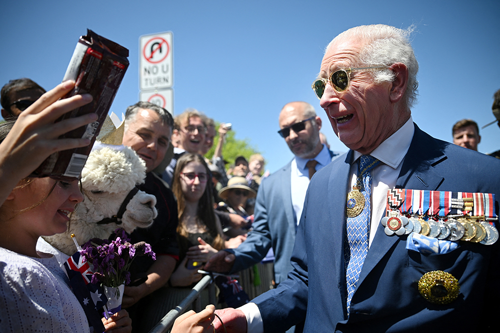 image King Charles greets happy crowds, a protesting MP and one alpaca on visit to Canberra