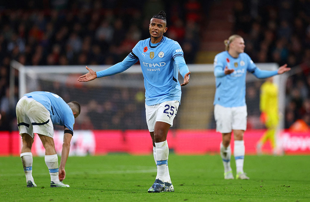 image Guardiola sees challenging season for injury-hit City with Sporting next