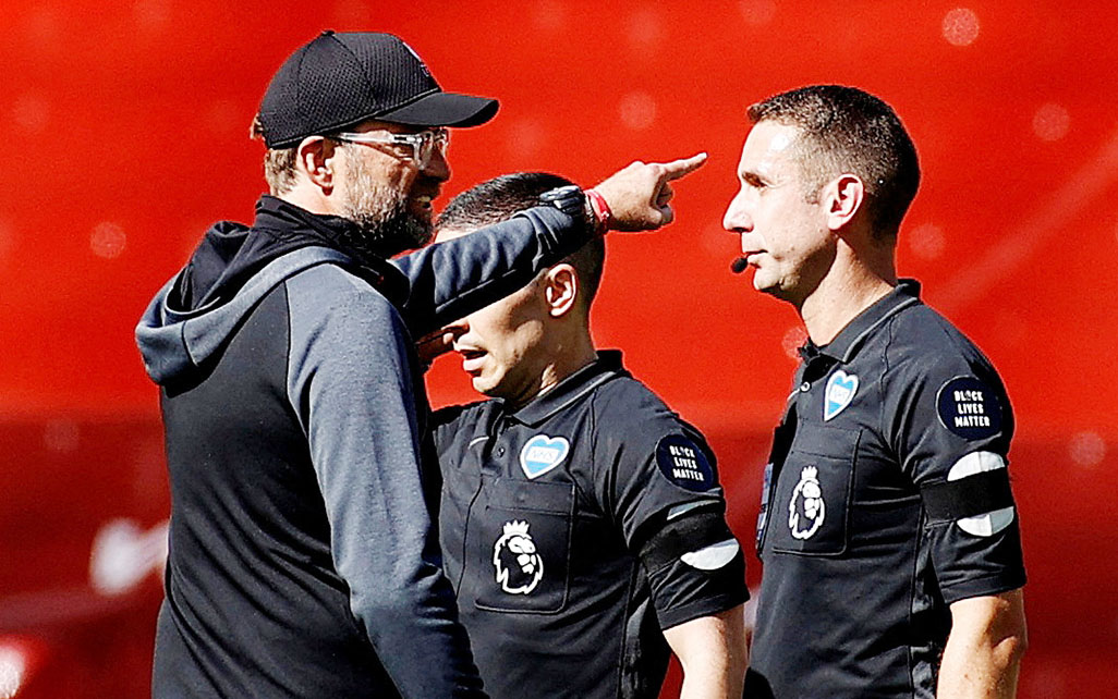 image FA charges referee Coote in relation to comments on Klopp