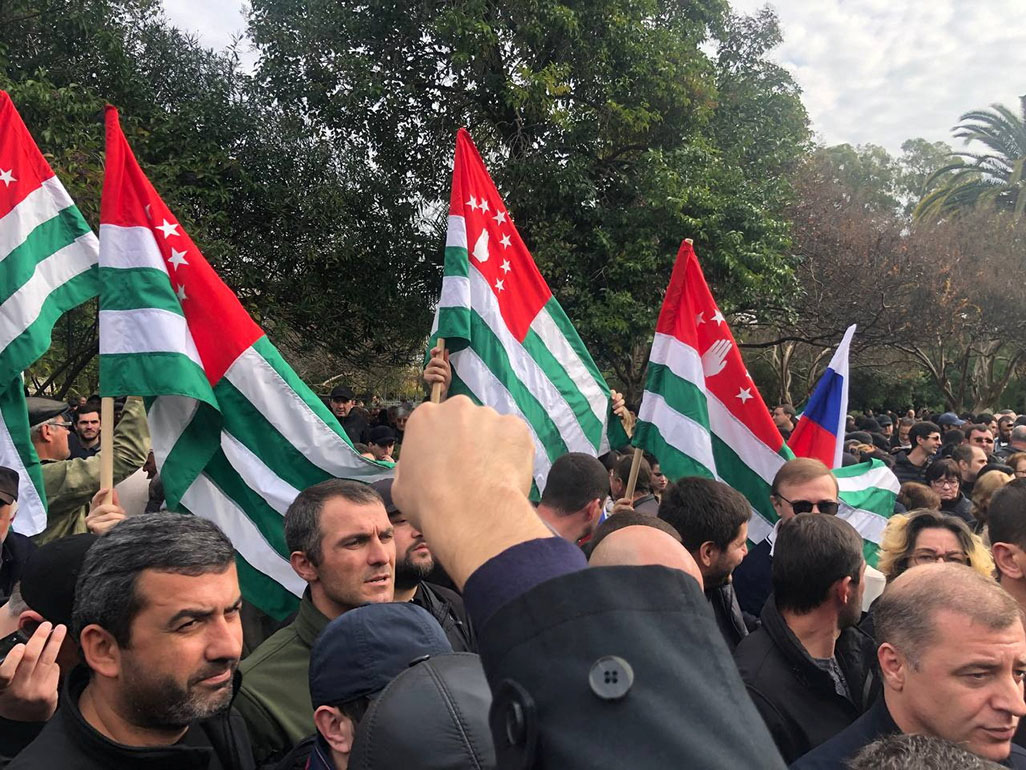 image Protesters storm parliament in breakaway Georgian region over deal with Russia