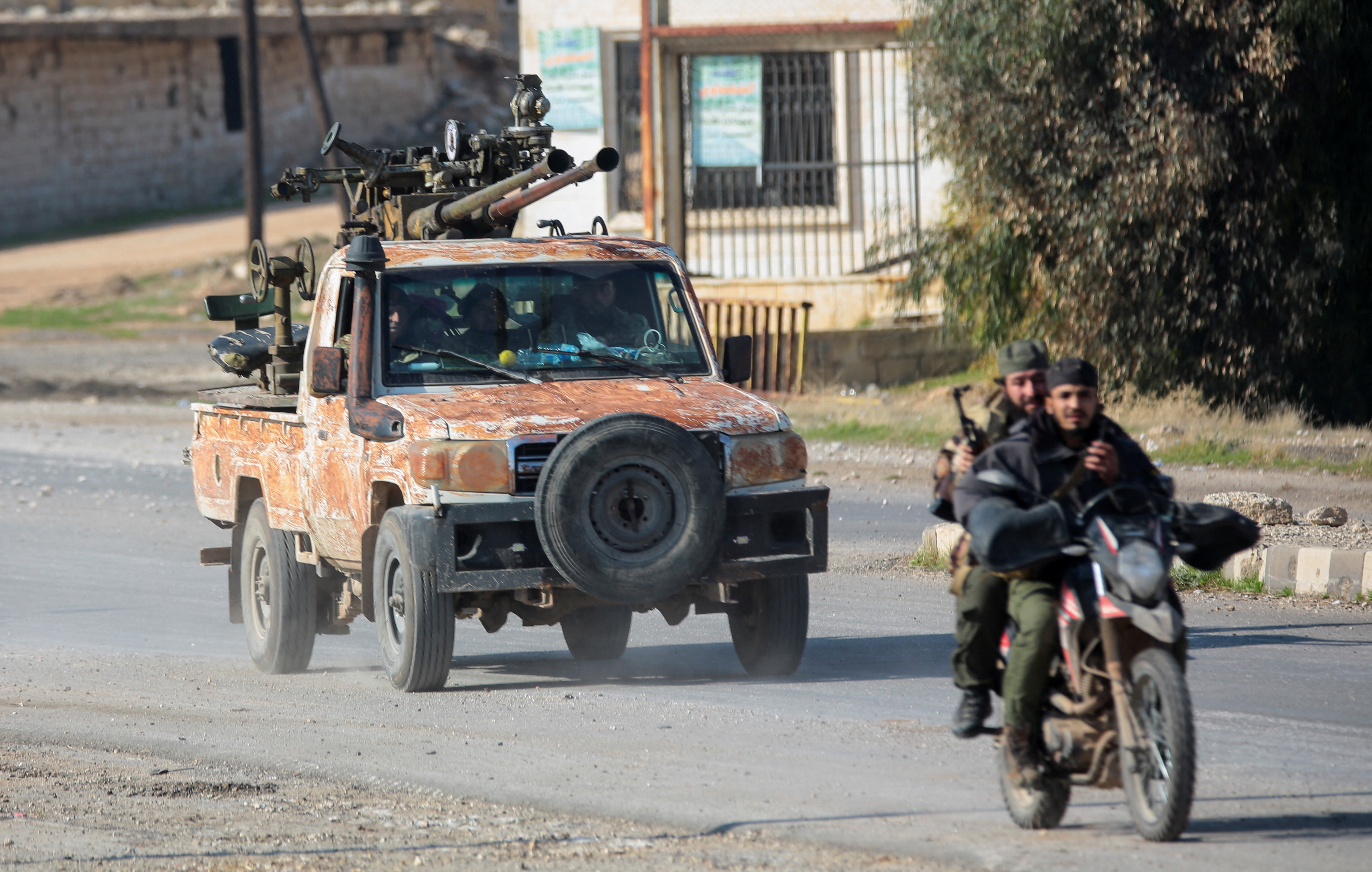 image Syrian rebels sweep into Aleppo, army says dozens of soldiers killed