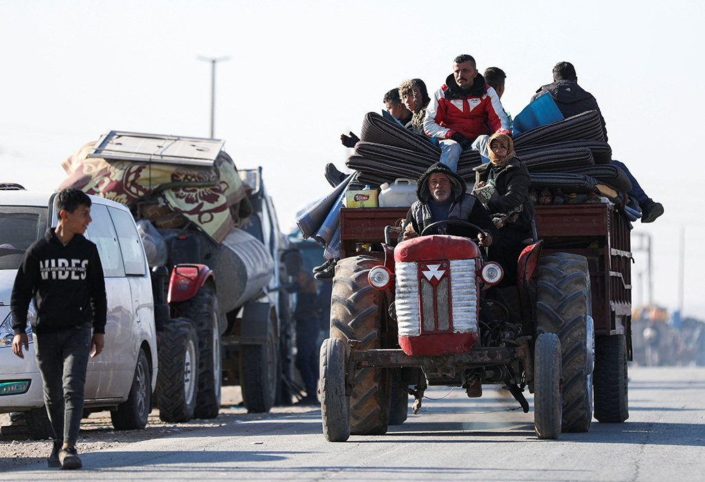 image Syrian military and rebels battle north of Hama