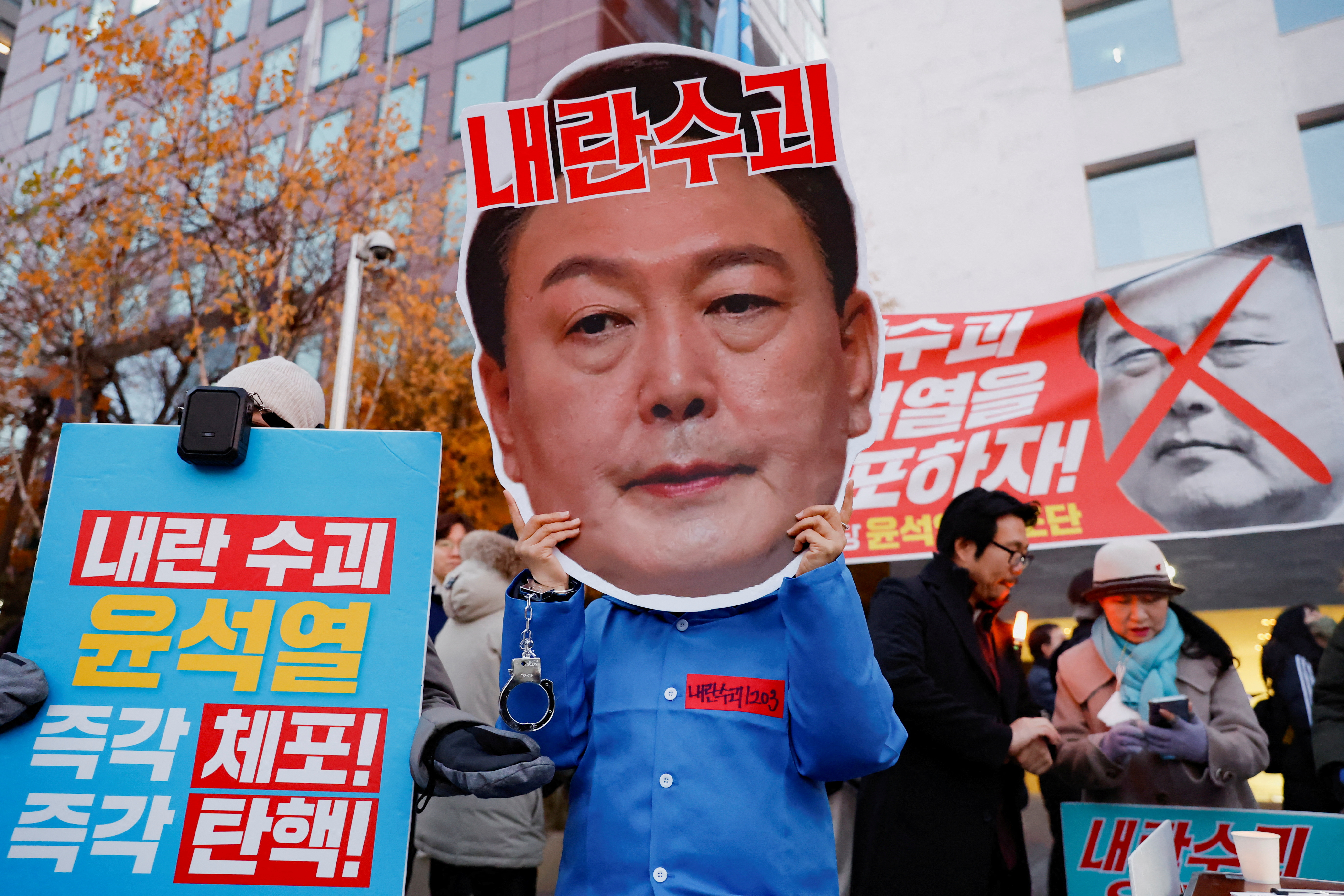 image South Korea police raid Yoon office over failed martial law as impeachment vote looms
