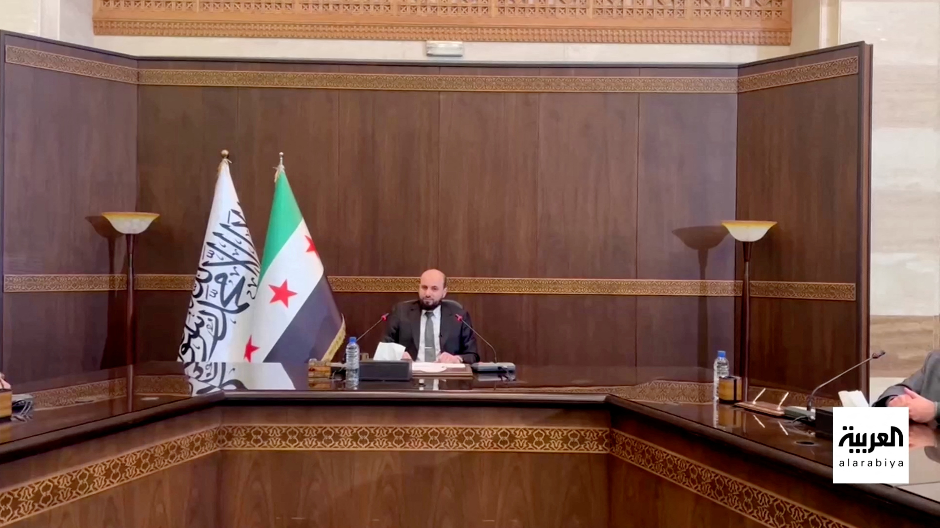 image Refugees return to Syria as caretaker prime minister appointed