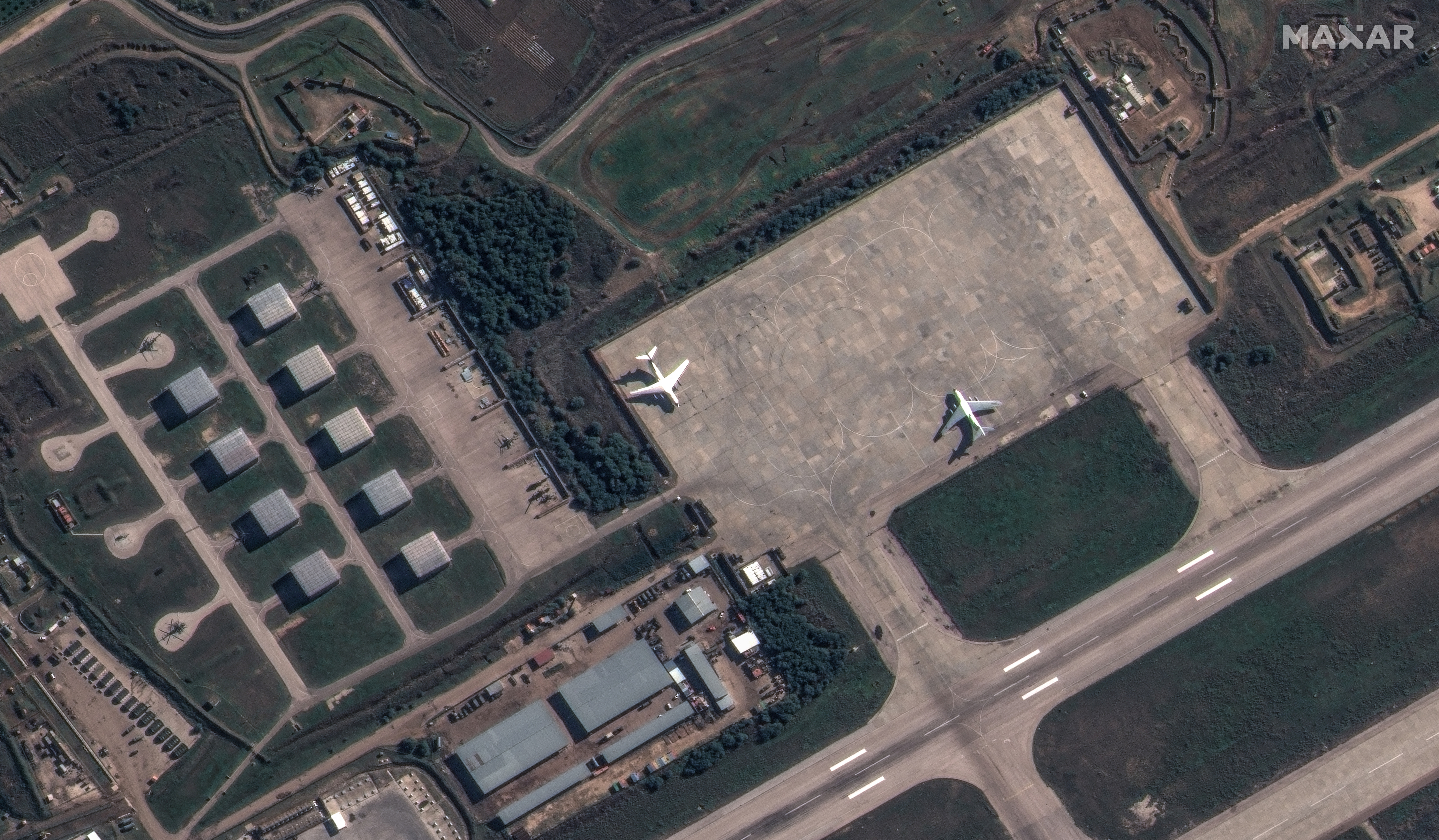 image Russia packing up military equipment at base in Syria, satellite images show