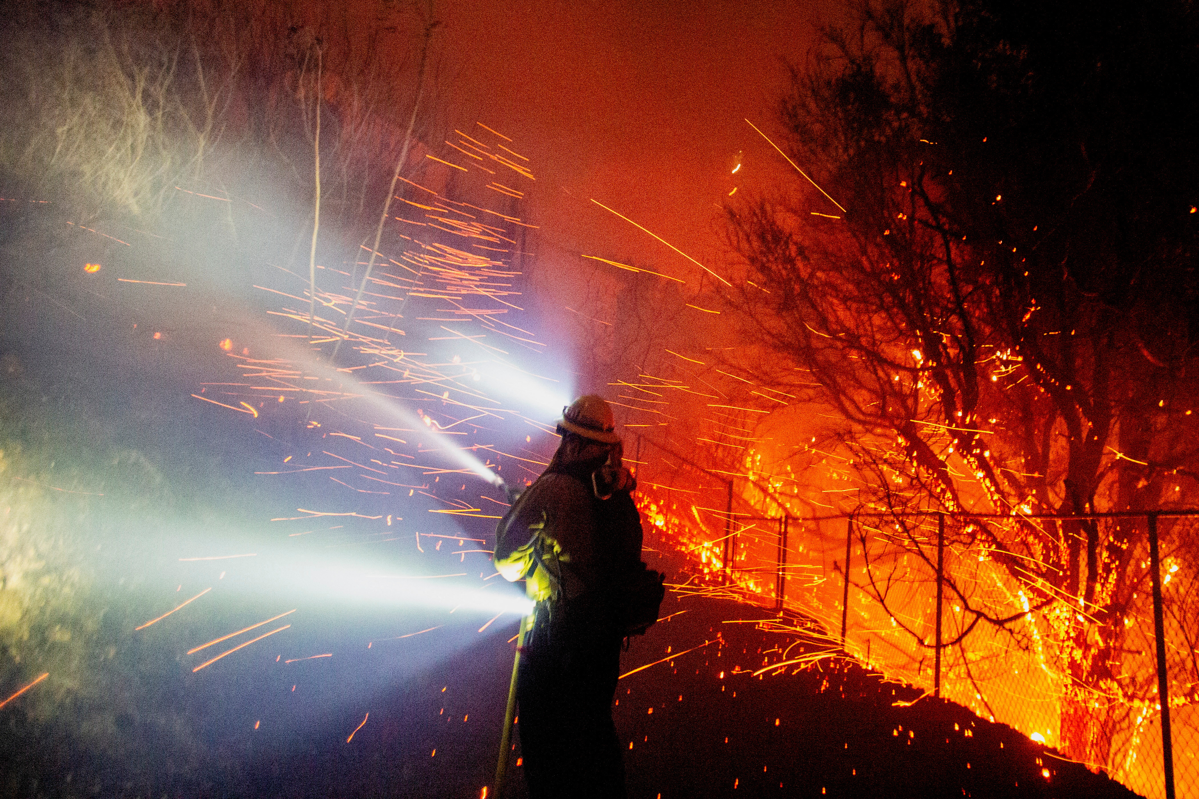 image Malibu wildfire rages on, destroys several structures