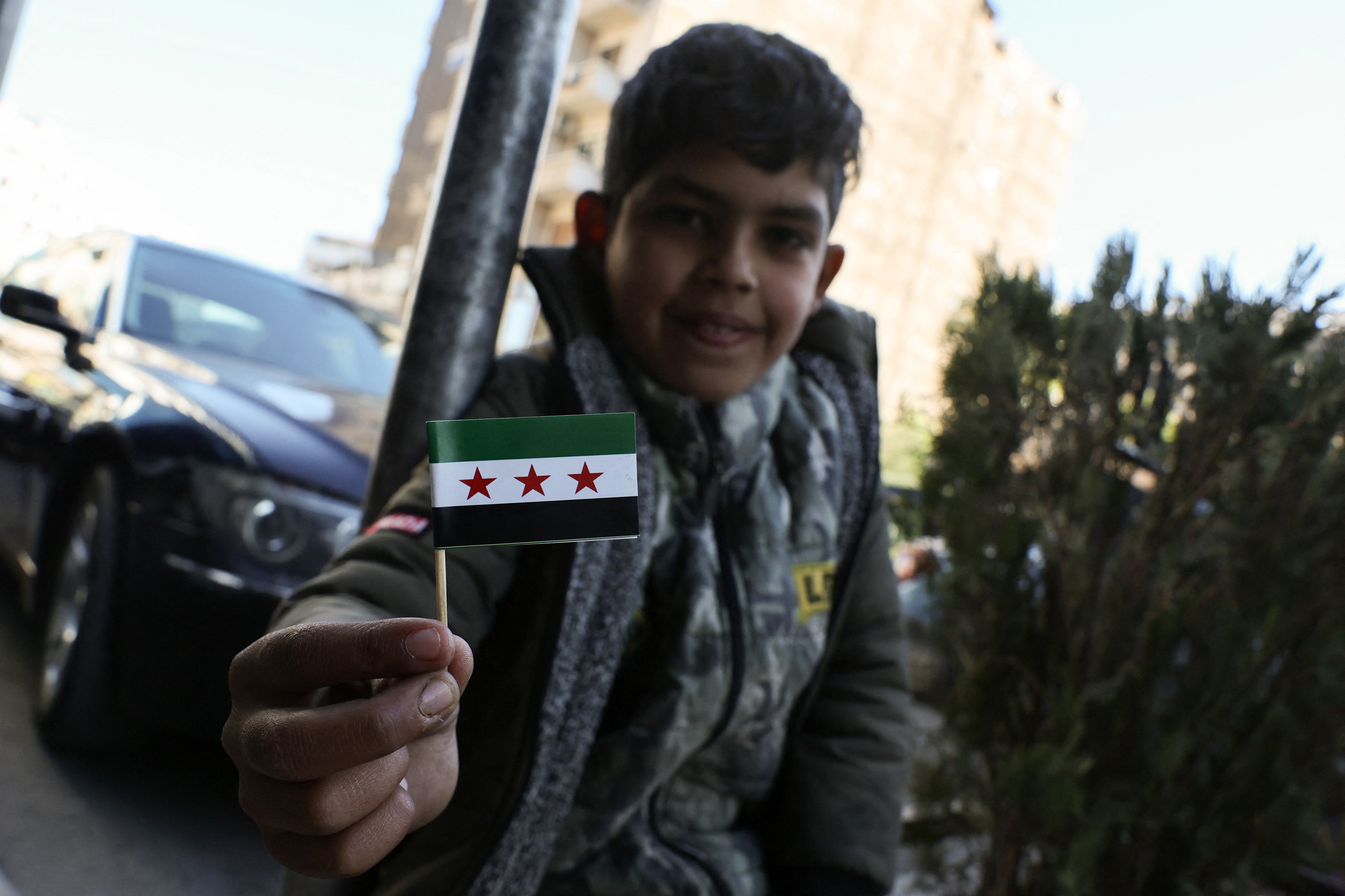 image France to host Syria meeting, cautious on aid, sanctions lifting
