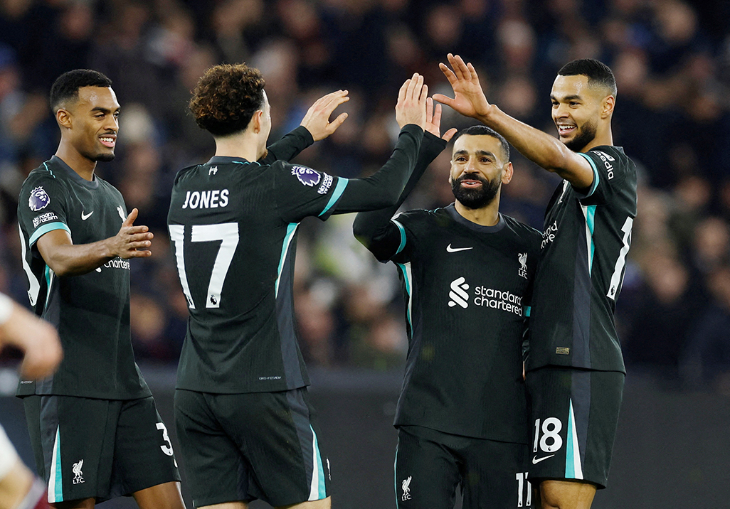 image Liverpool go eight points clear, Forest up to second