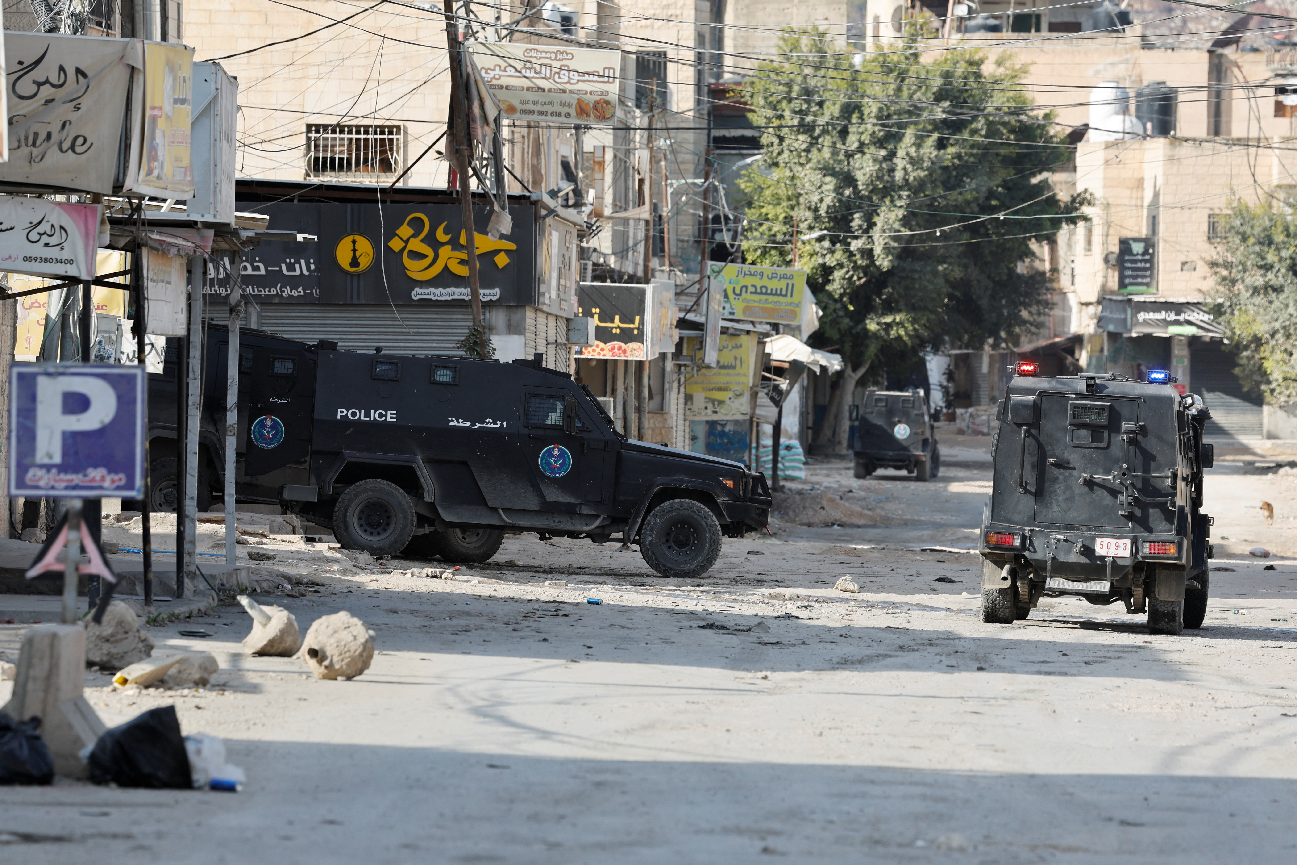 image Palestinian security forces clash with militants in West Bank