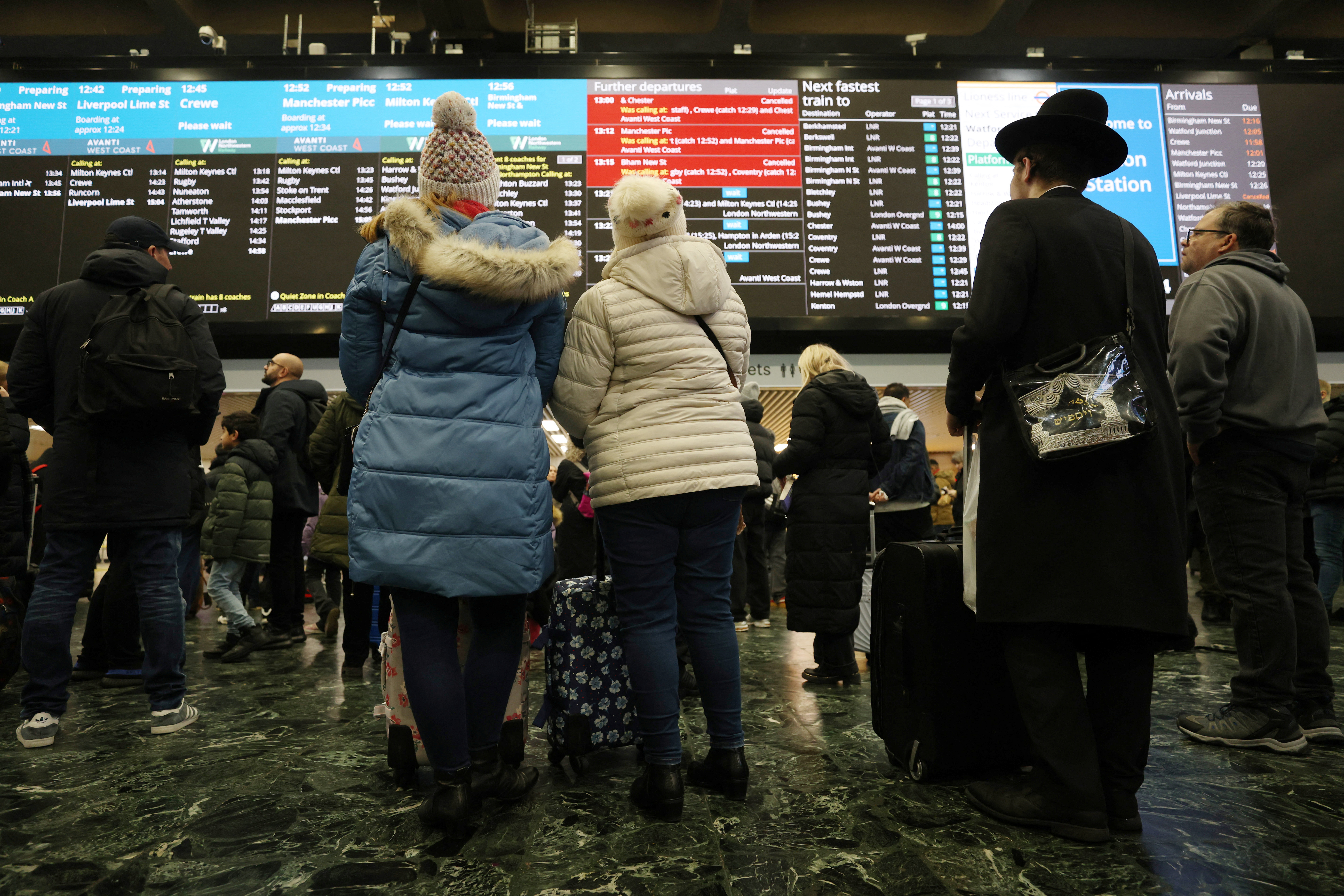 image Britain faces snow and flooding as travel disrupted