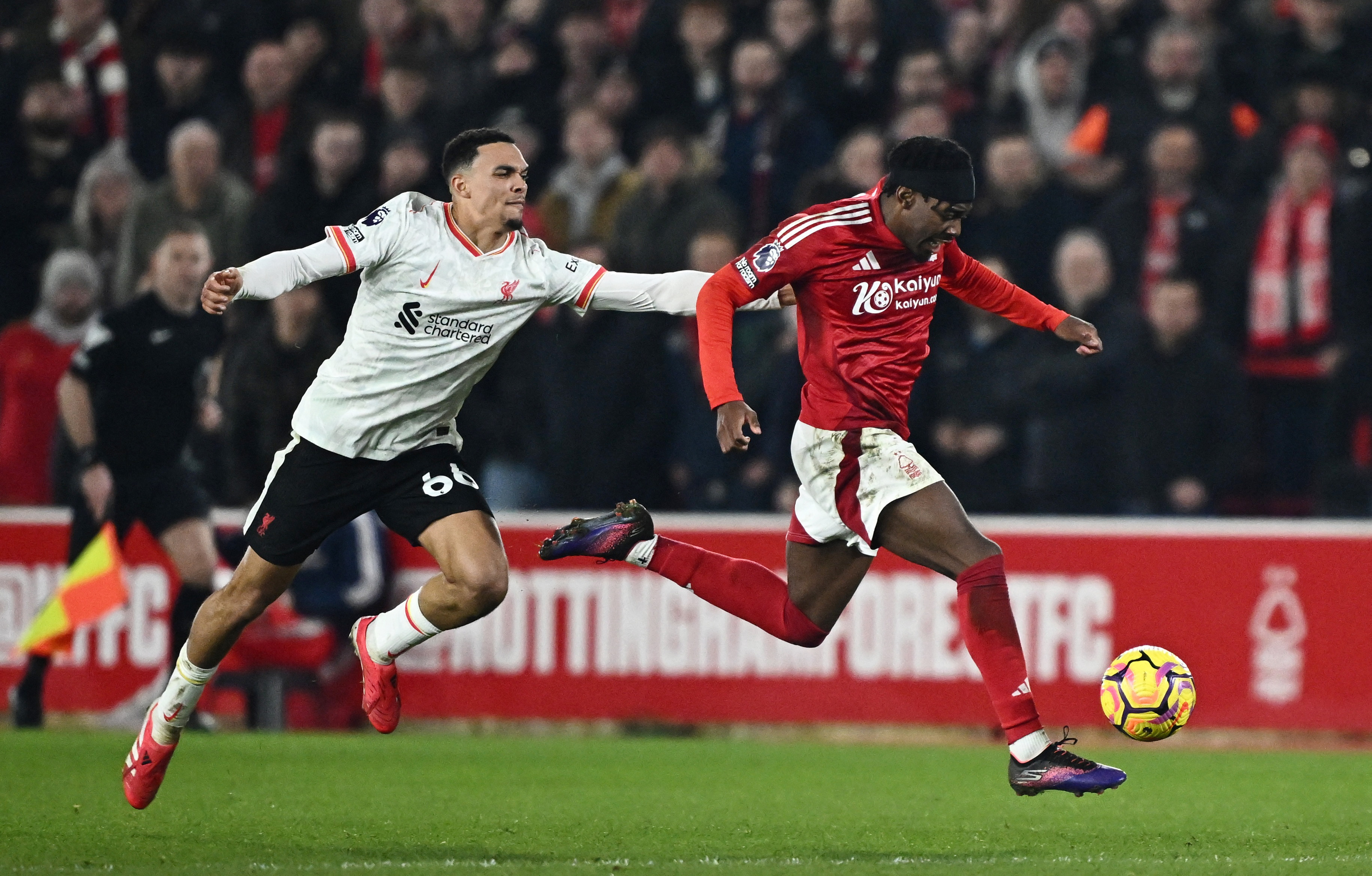 image Jota earns leaders Liverpool 1-1 draw at high-flying Forest, City held at Brentford after late collapse
