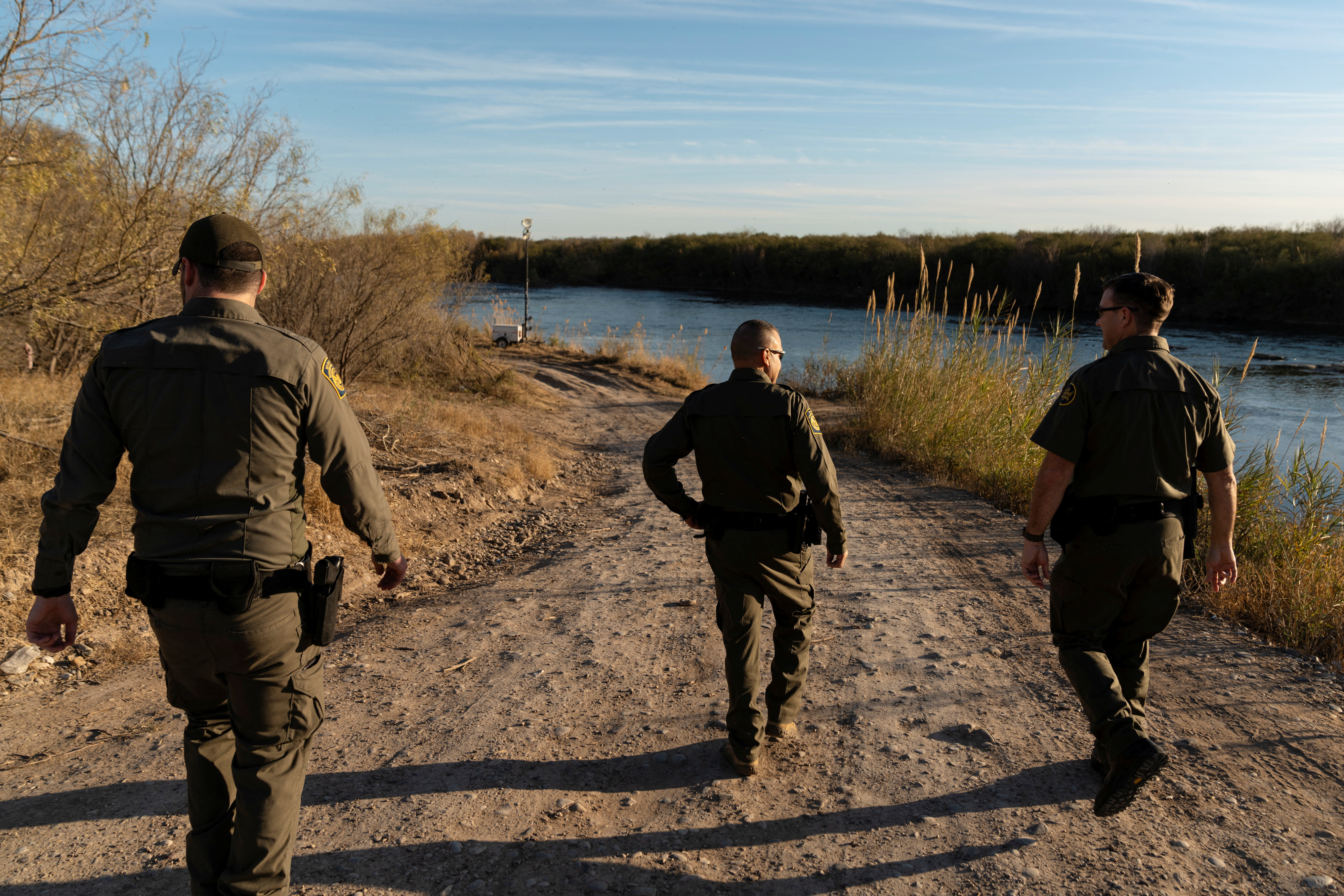 image Trump steps up immigration crackdown, warns city, state officials against interference