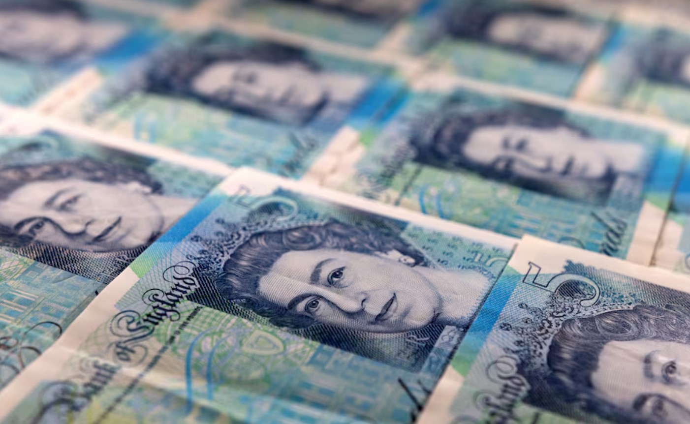 image Sterling hits 5-month low versus euro on rate cut bets