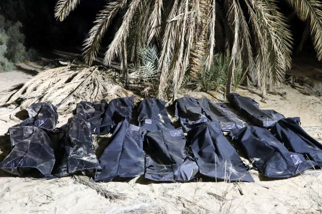 image Migrants&#8217; bodies in Libya mass graves had gunshot wounds, IOM says