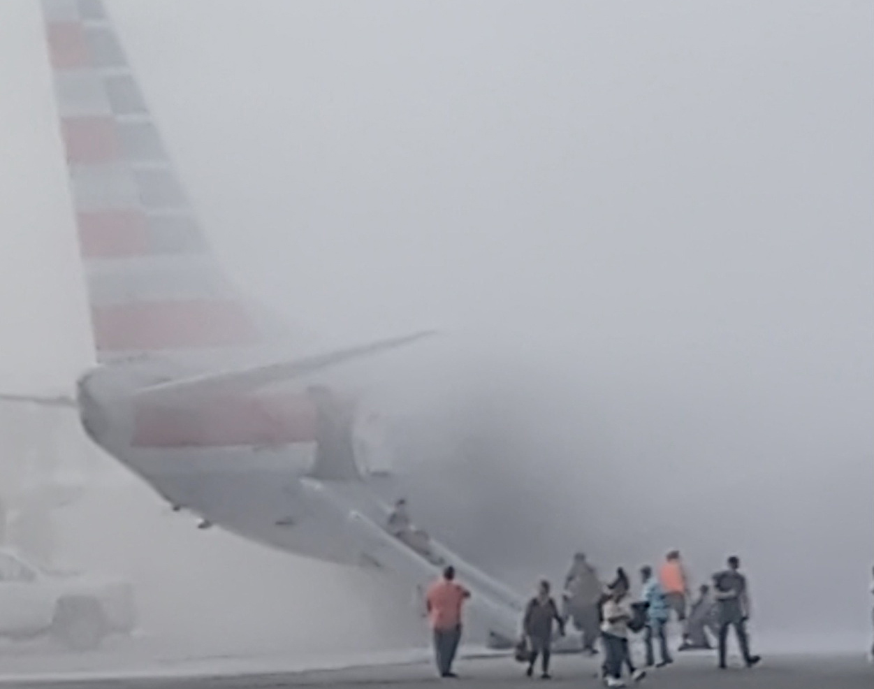 image American Airlines jet engine catches fire after landing in Denver, passengers evacuated