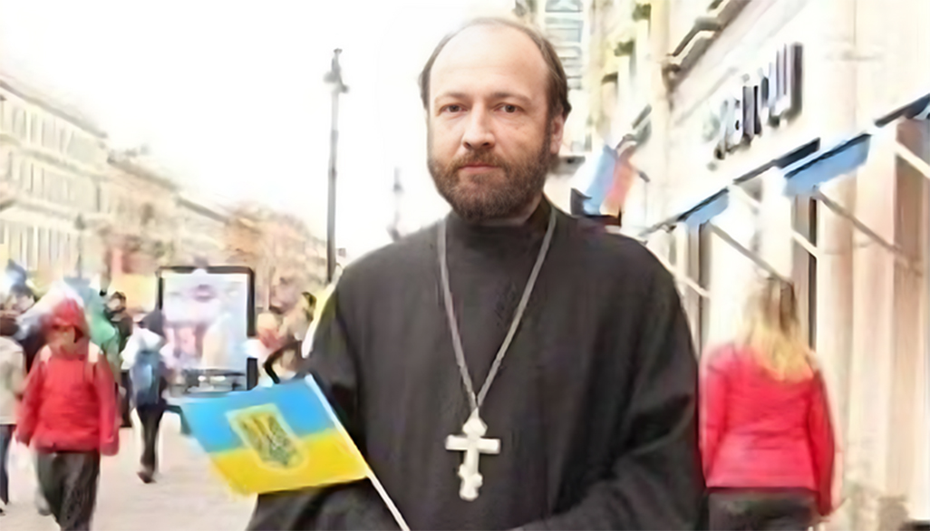 image Russian priest arrested over 2014 photo with Ukrainian flag