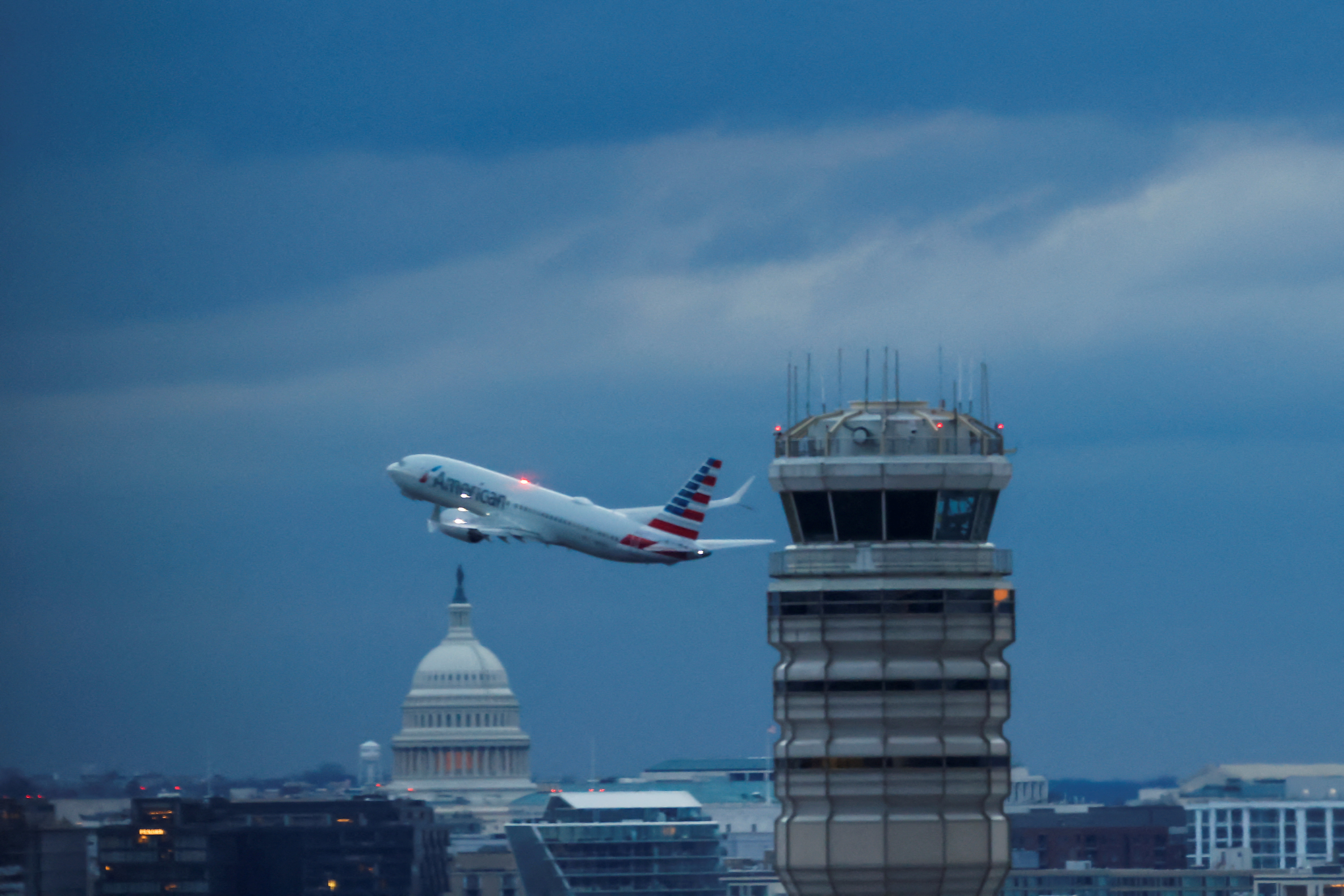image American Airlines plane struck on ground at Washington airport by another plane, no injuries reported