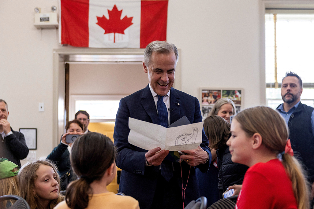 image Canadians vote in election dominated by concerns about Trump