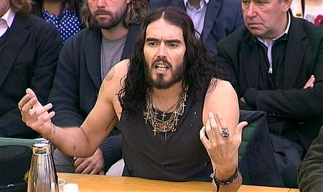 image UK police charge comedian Russell Brand with rape, sexual assaults