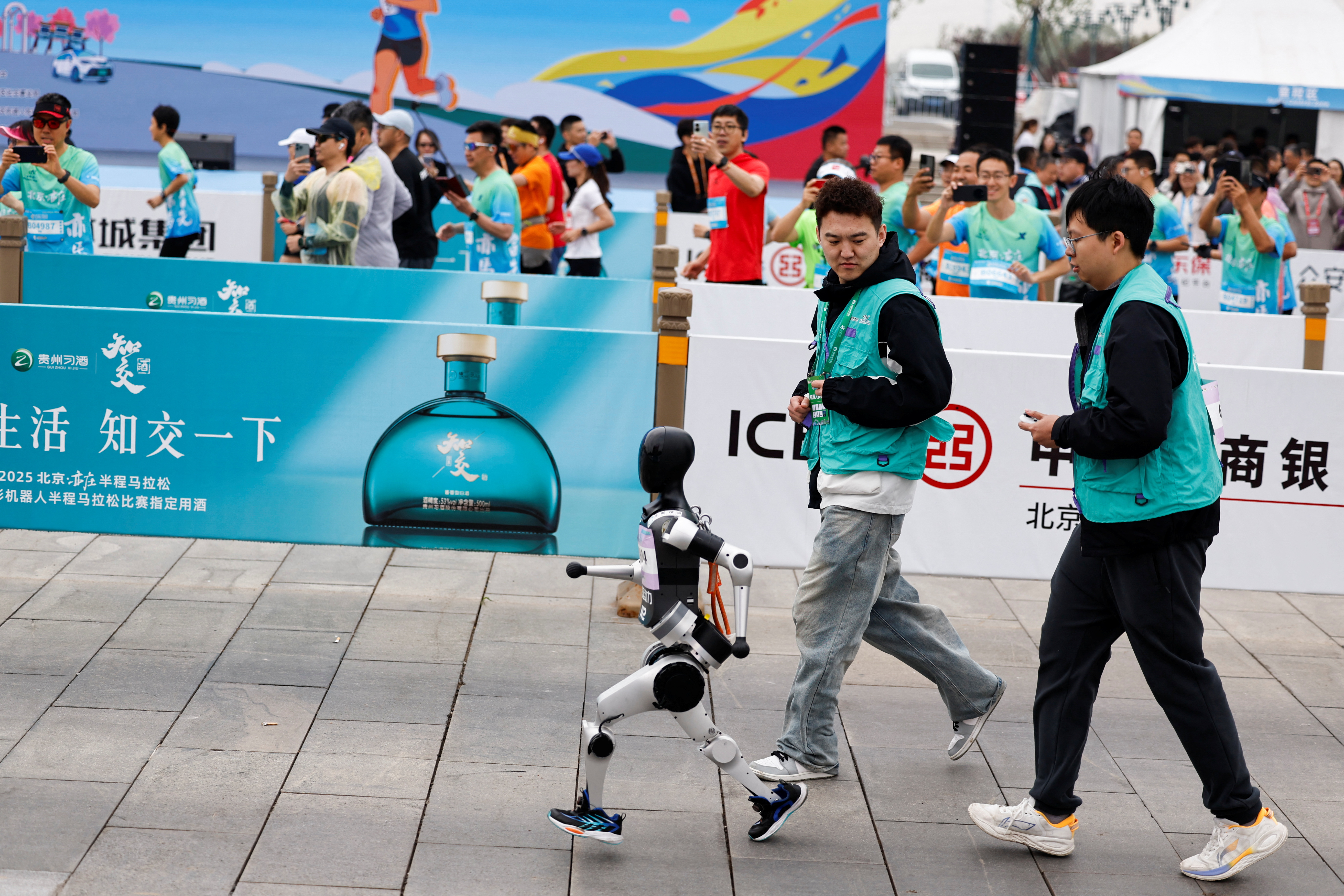 image China pits humanoid robots against humans in half-marathon