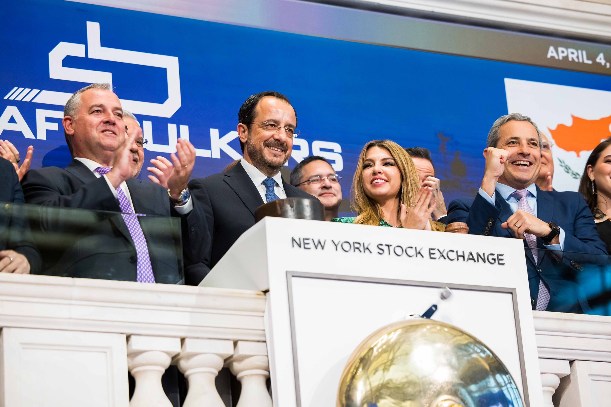 image Christodoulides rings New York stock exchange closing bell