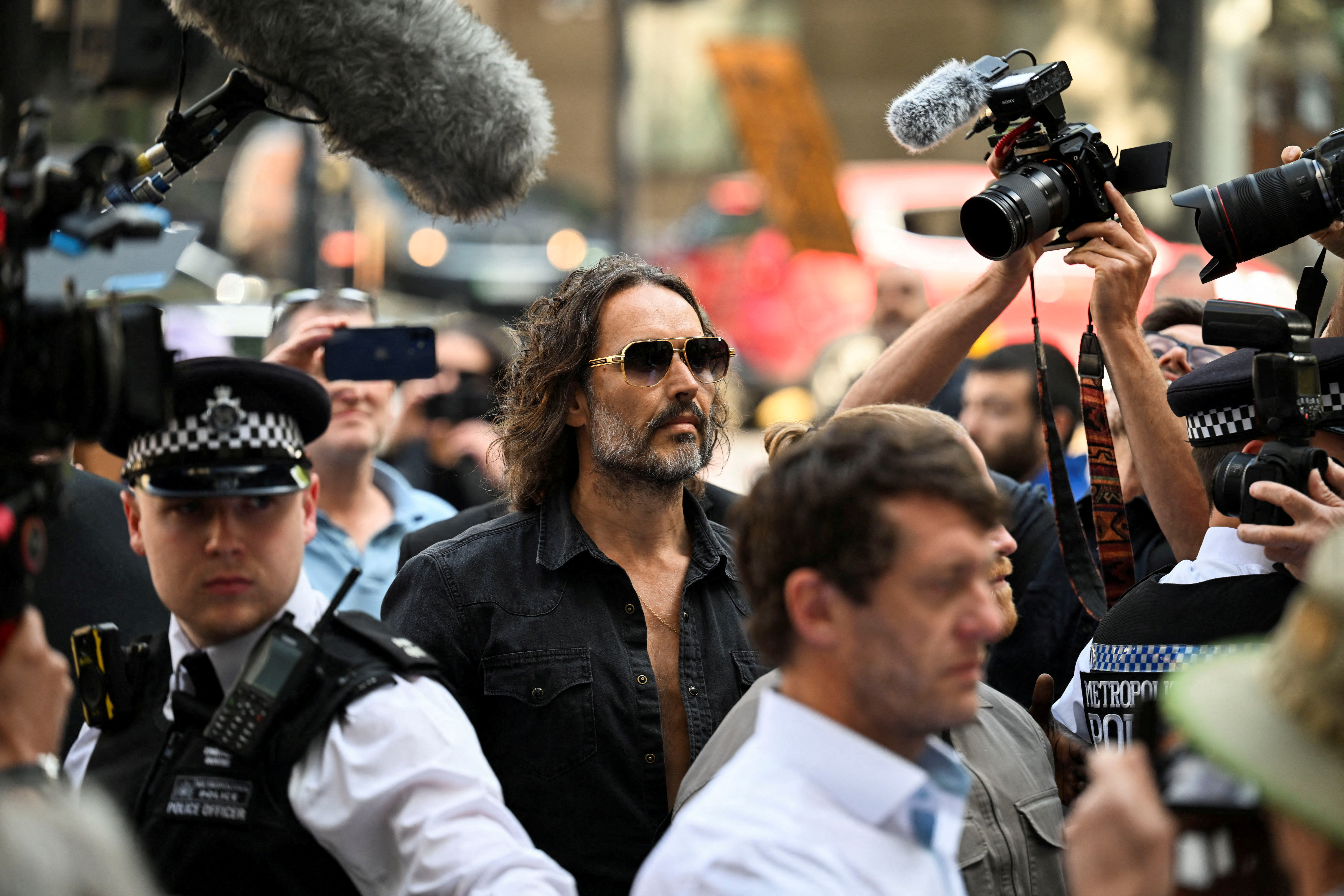image Comedian Russell Brand due in UK court to face rape and sex assault charges