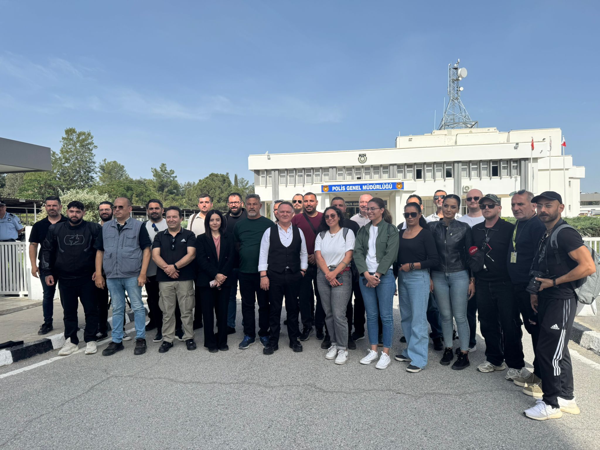 image Journalists gather at north police HQ demanding protection for under-threat colleague