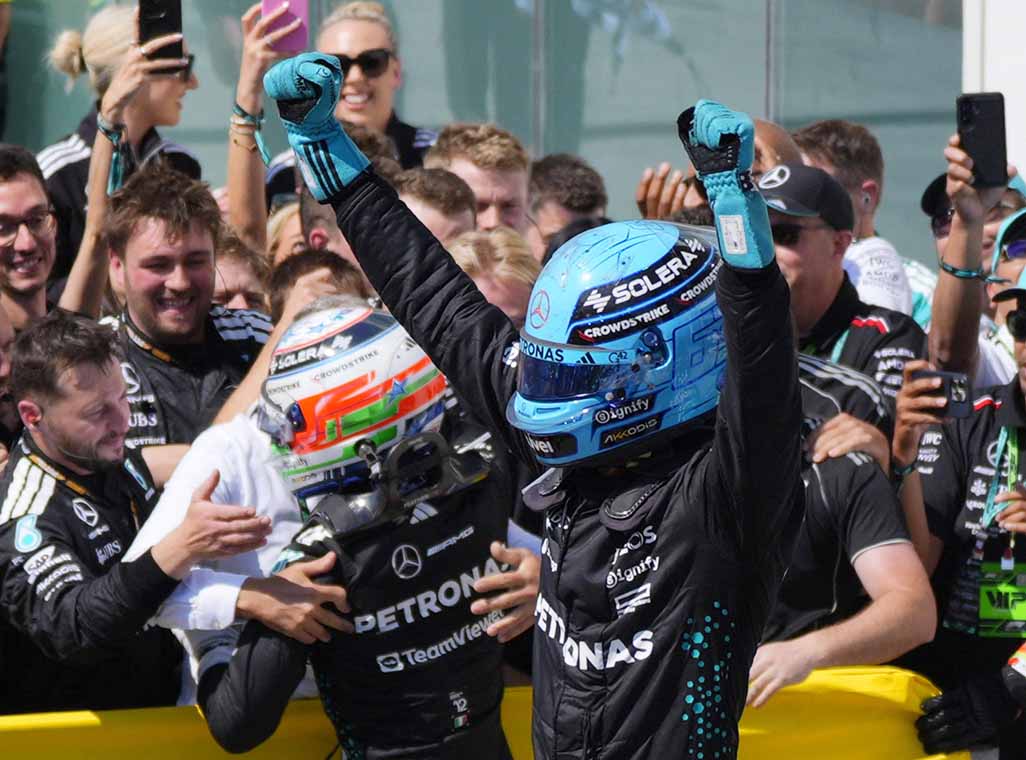 image Russell wins in Canada after McLarens collide