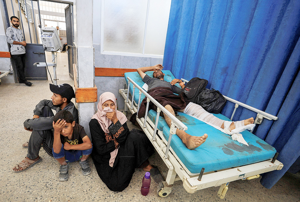 cover Israeli fire kills 140 in Gaza in 24 hours, medics say, as attention shifts to Iran
