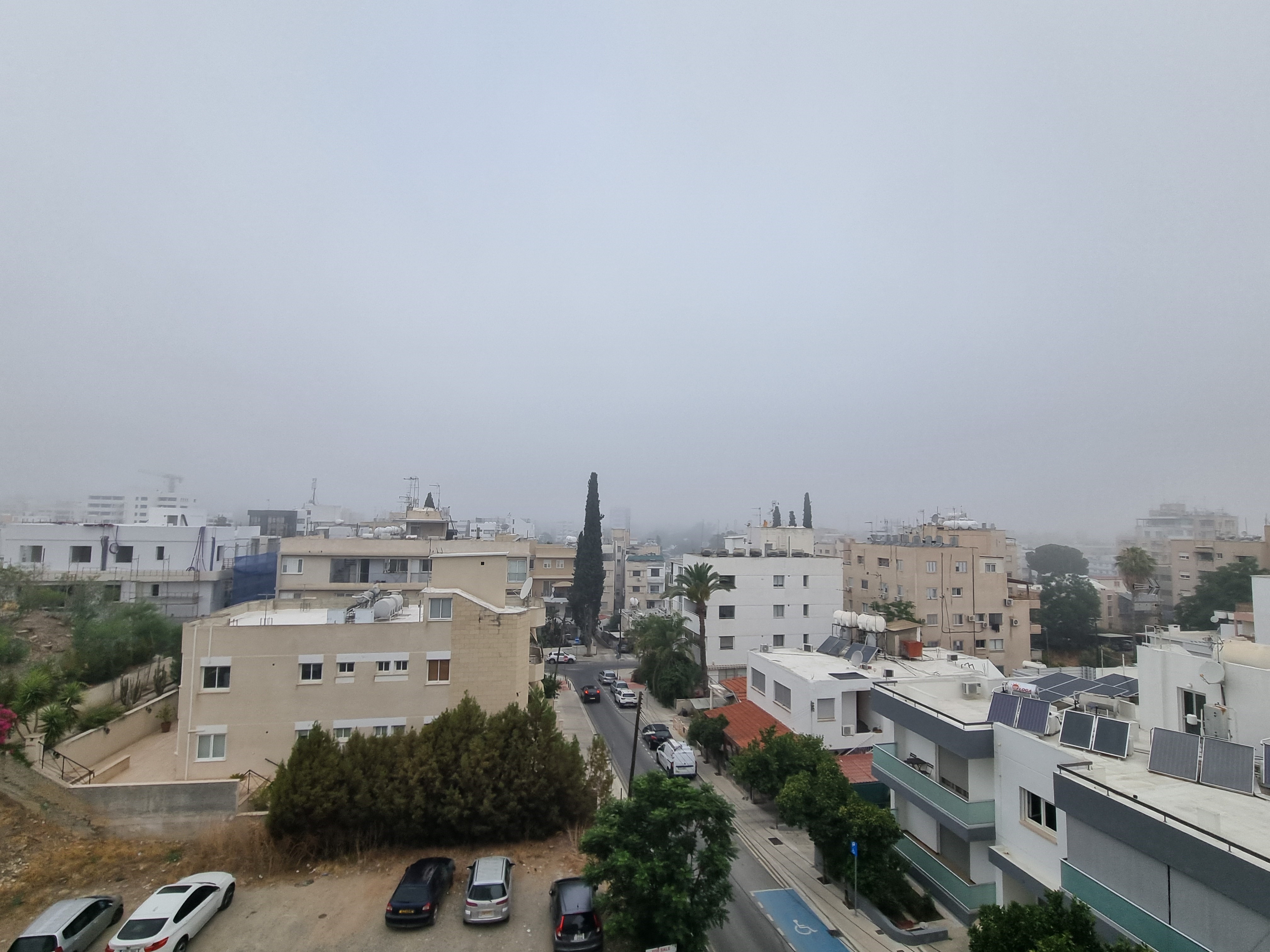 cover Nicosia wakes to thick morning fog