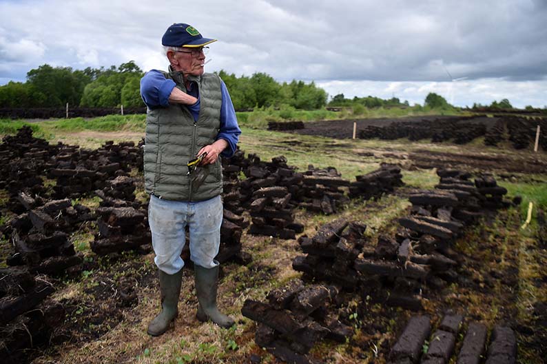 cover On Ireland’s peat bogs, climate action clashes with tradition