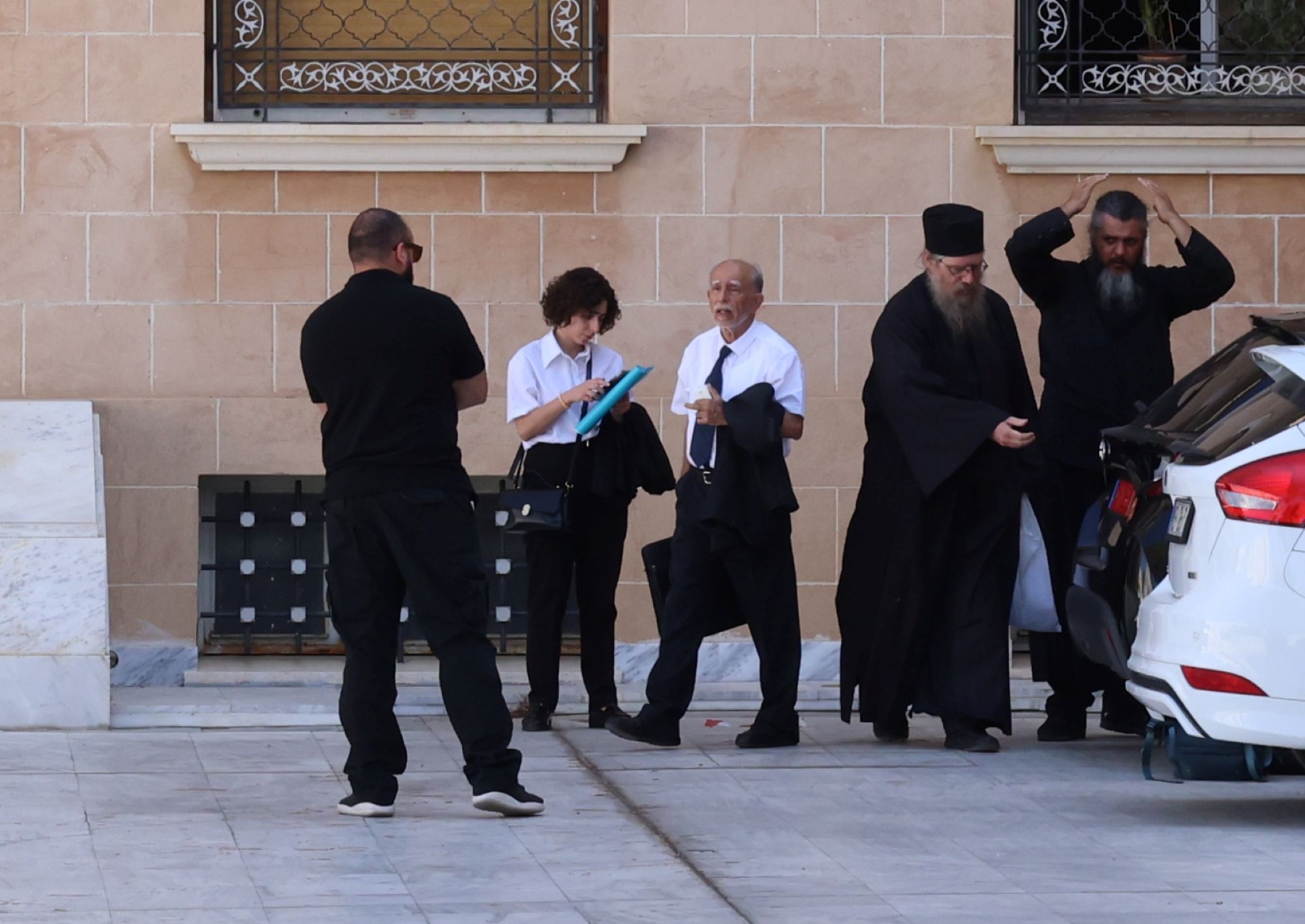 cover Cleric defrocked for criticising archbishop and patriarchate