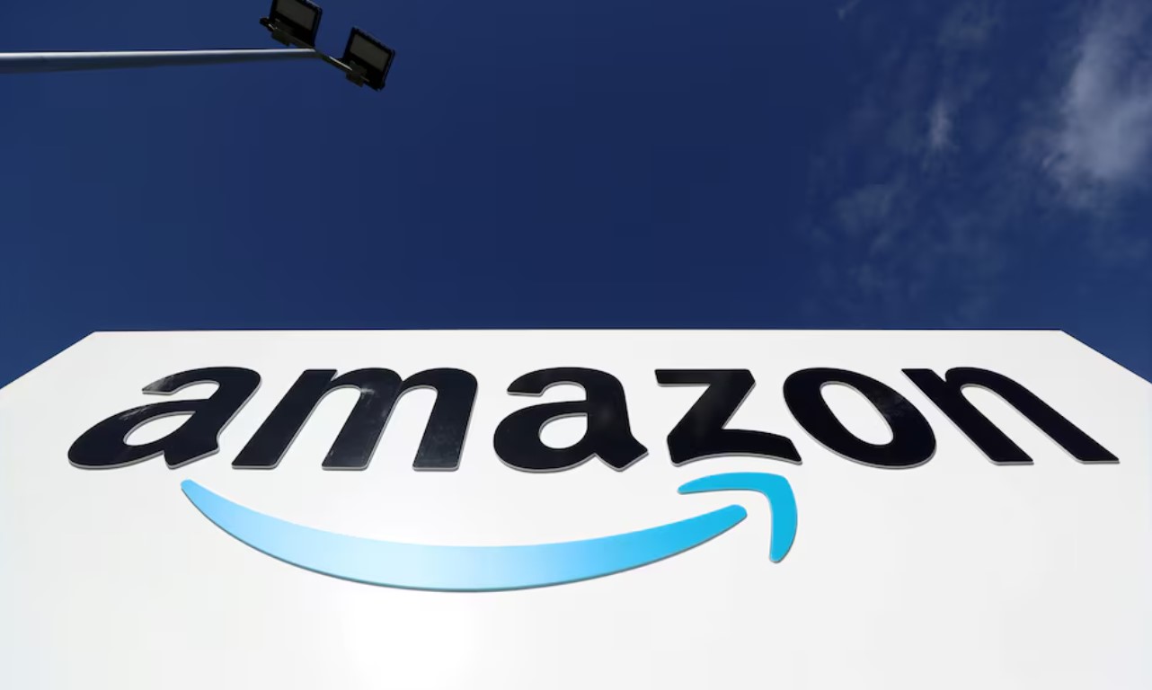 cover Amazon to invest $54 billion in Britain over next three years