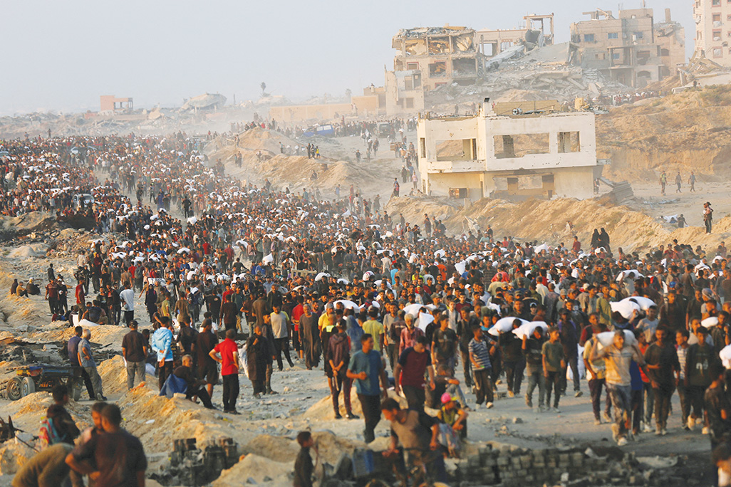 image As death toll rises, Gazans make life-risking journeys to seek food