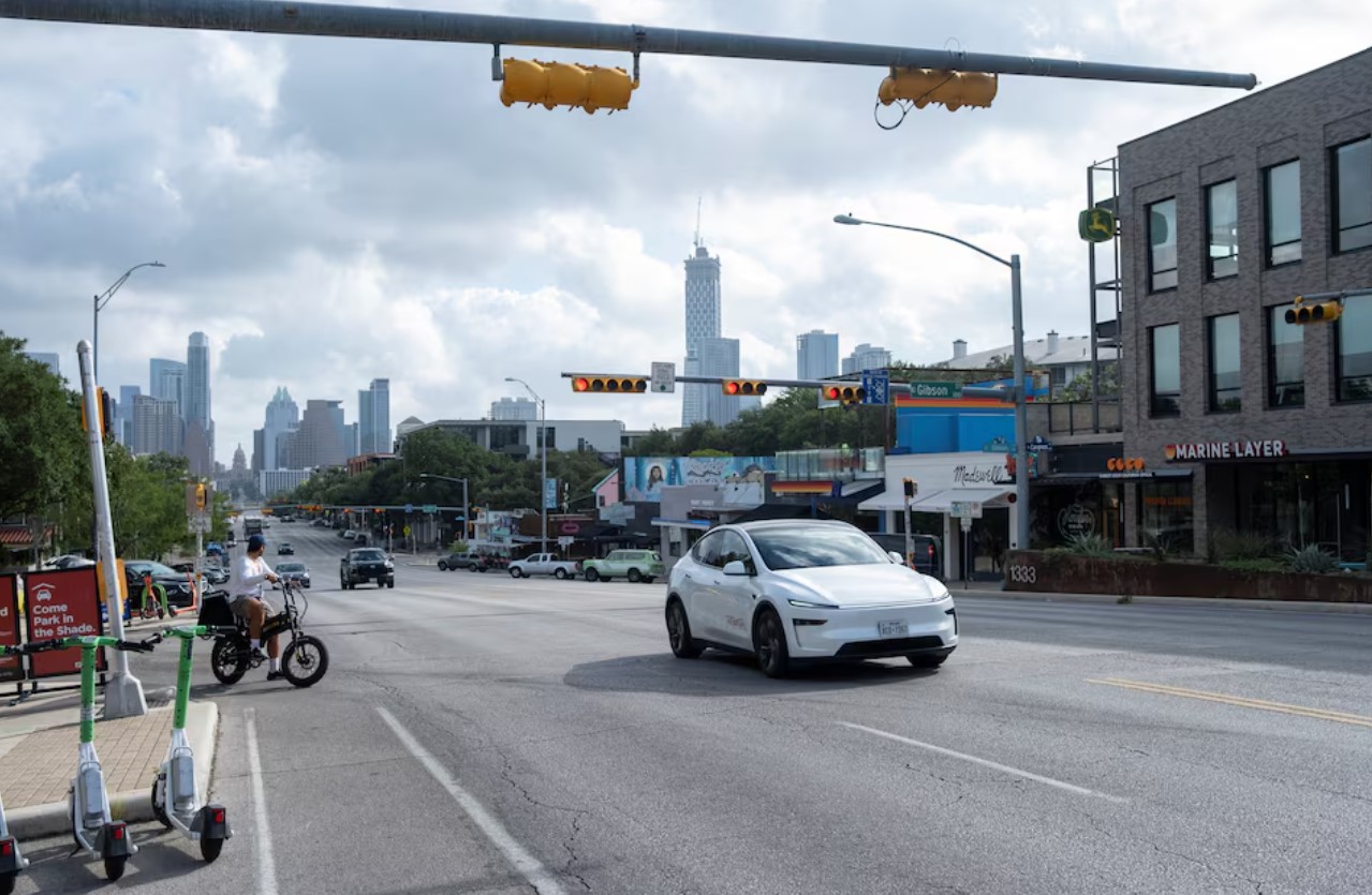 cover Tesla launches robotaxi test but experts warn of long road to scale