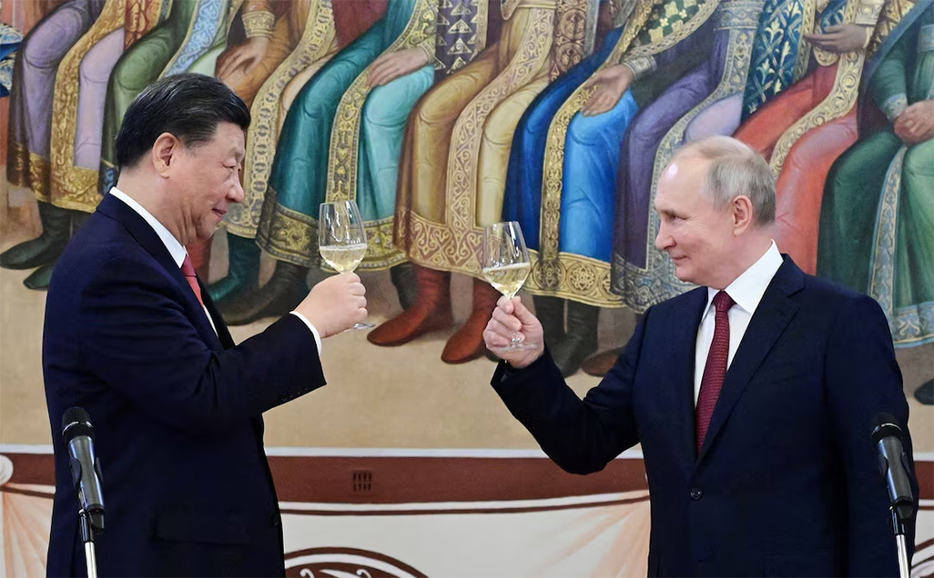 cover Putin and Xi condemn Israel over its Iran strikes in phone call