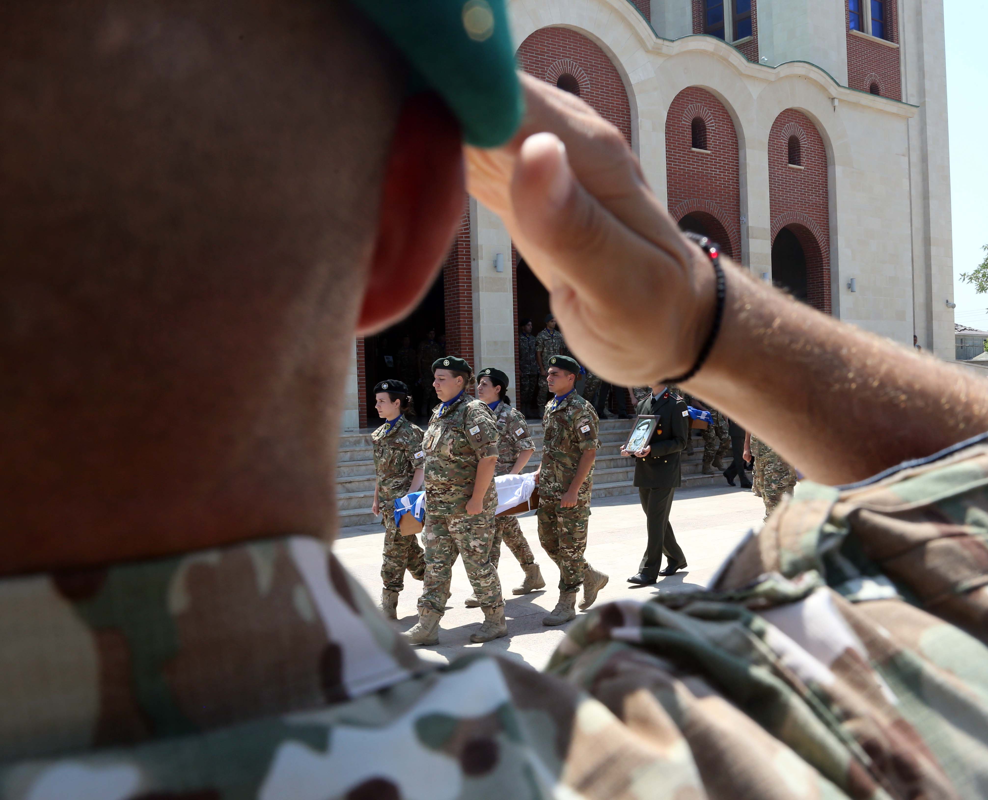 cover Tribute paid to Greek soldiers killed in 1974 as bones repatriated 