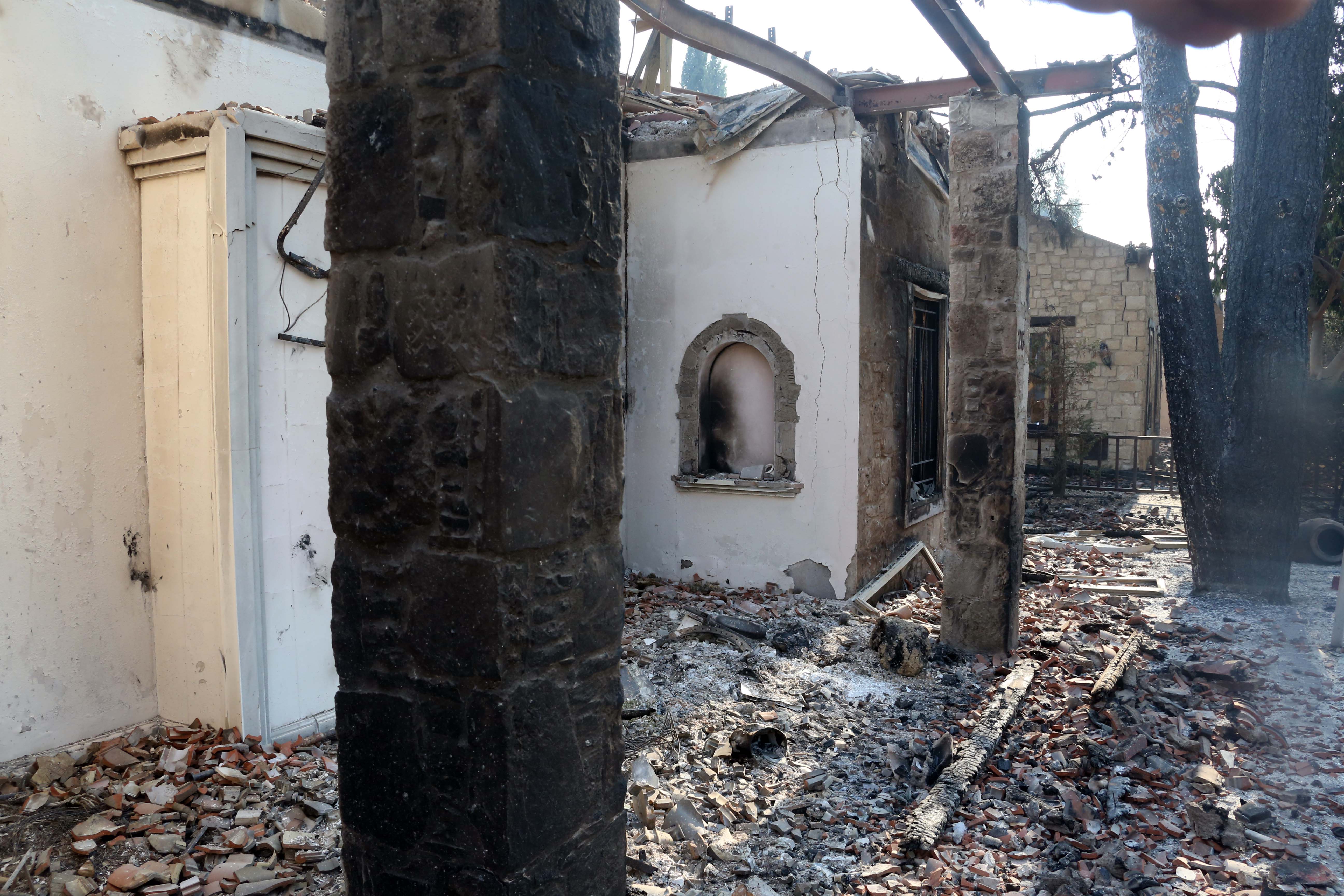 cover Officials visit fire-hit villages to outline support on offer