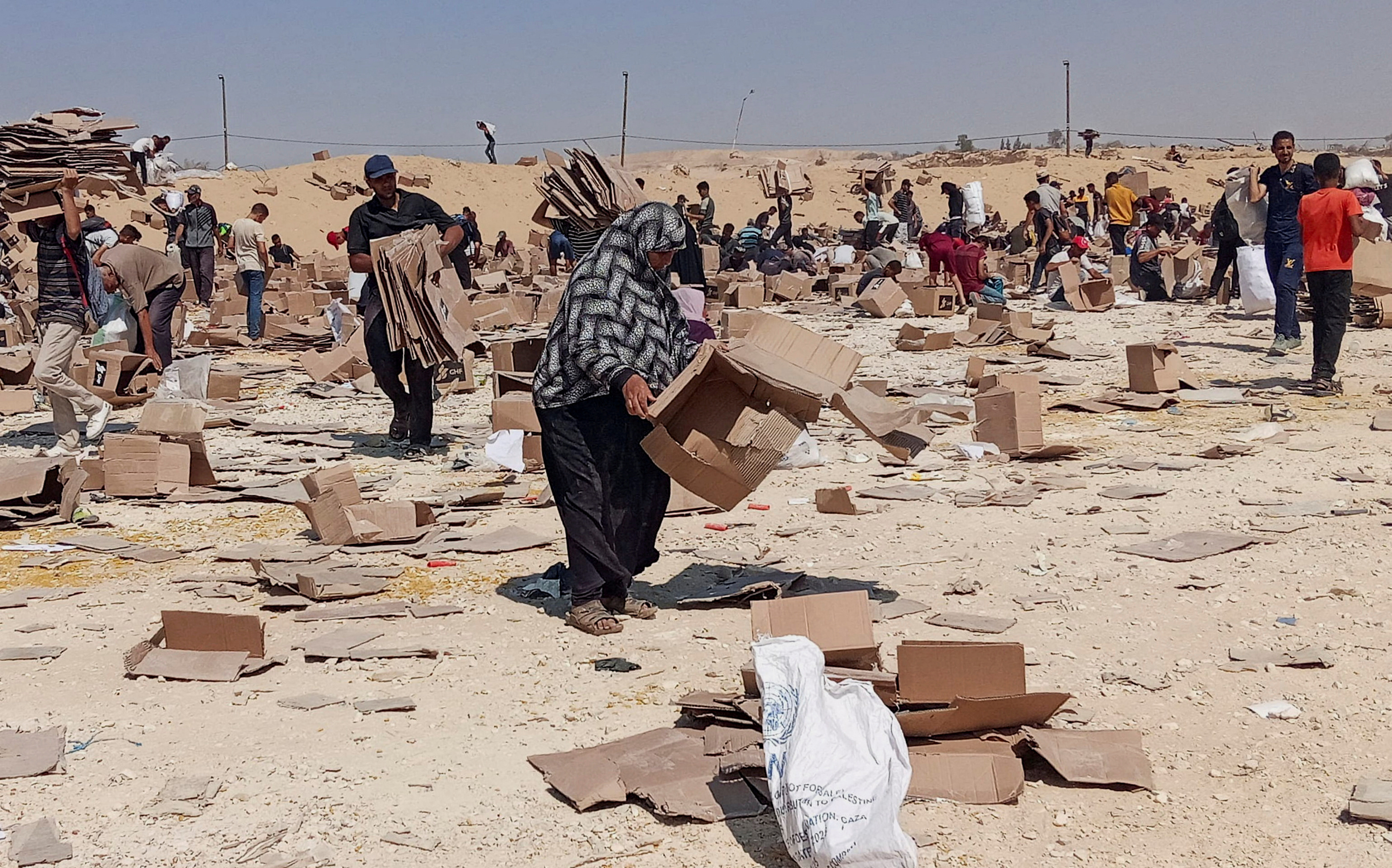 cover Crush at Gaza aid site kills at least 20, GHF blames armed agitators