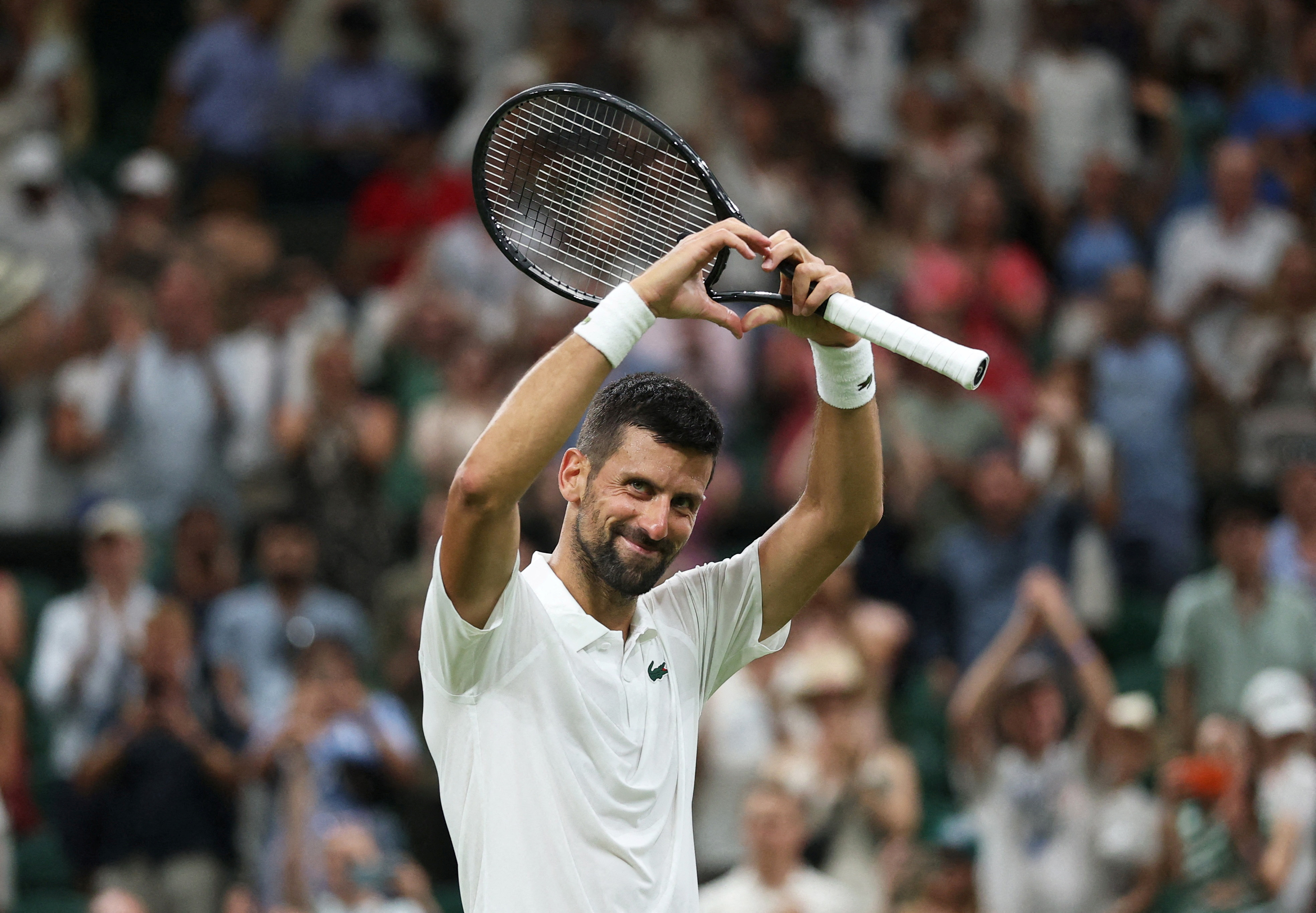 cover Djokovic faces Evans test at Wimbledon