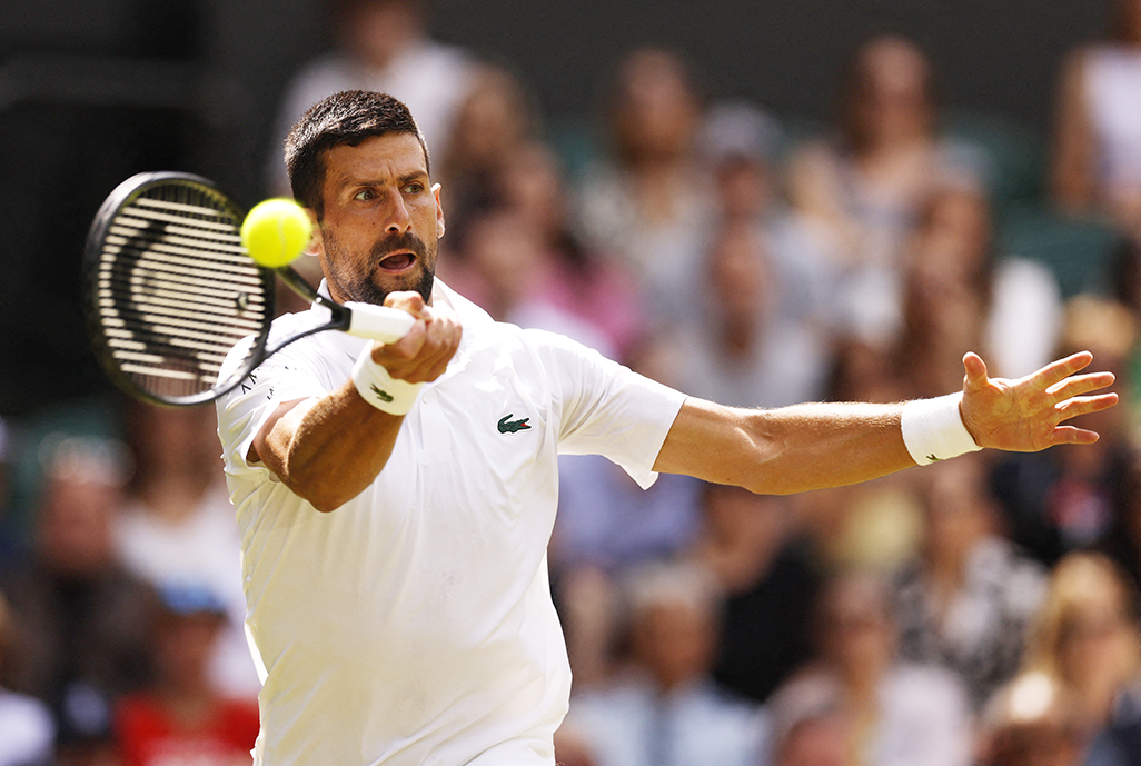 cover Djokovic rolls back the years to crush Britain&#8217;s Evans