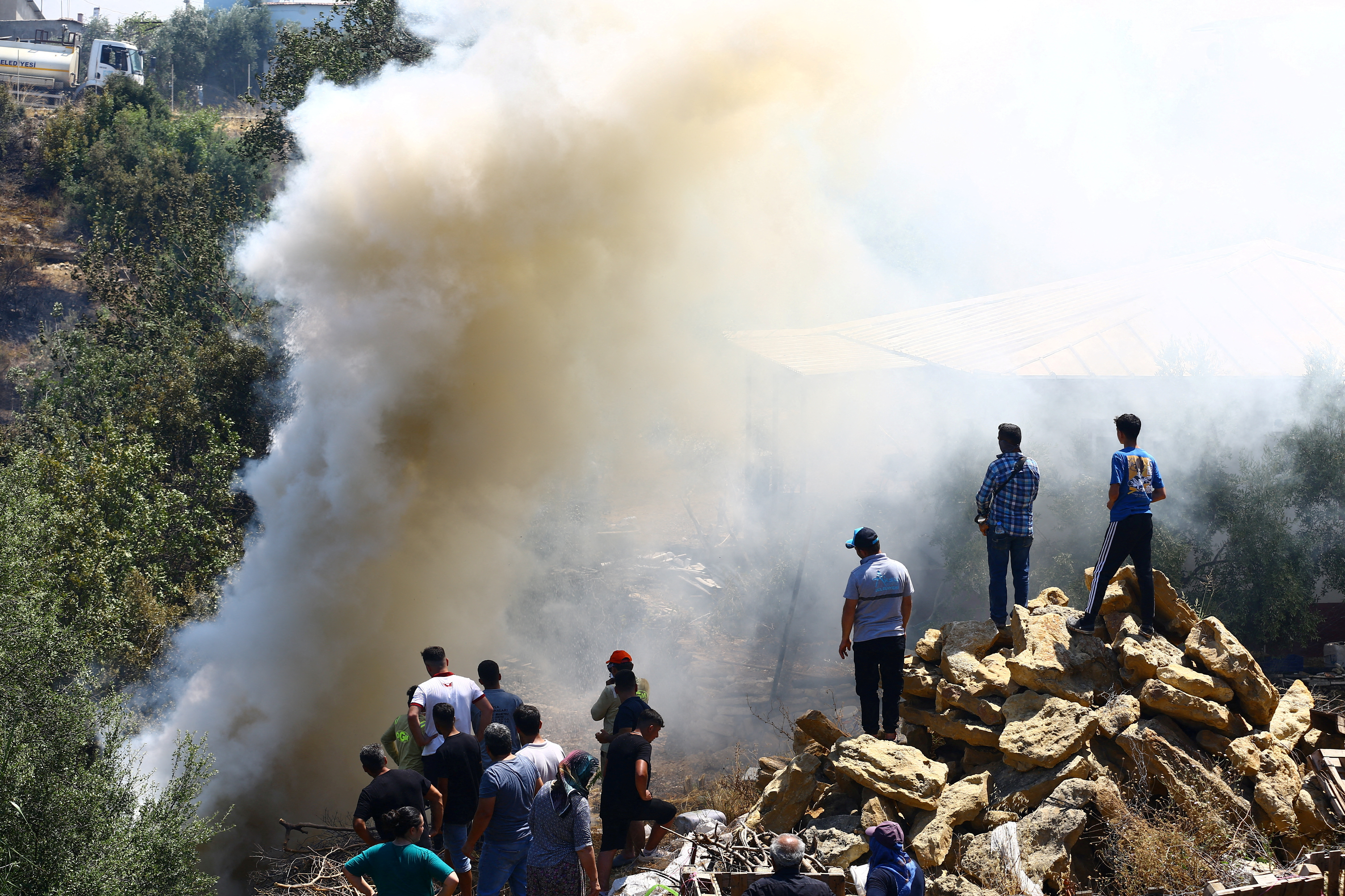 cover Firefighters battle blazes in Turkey, Greece and Albania after days of scorching heat