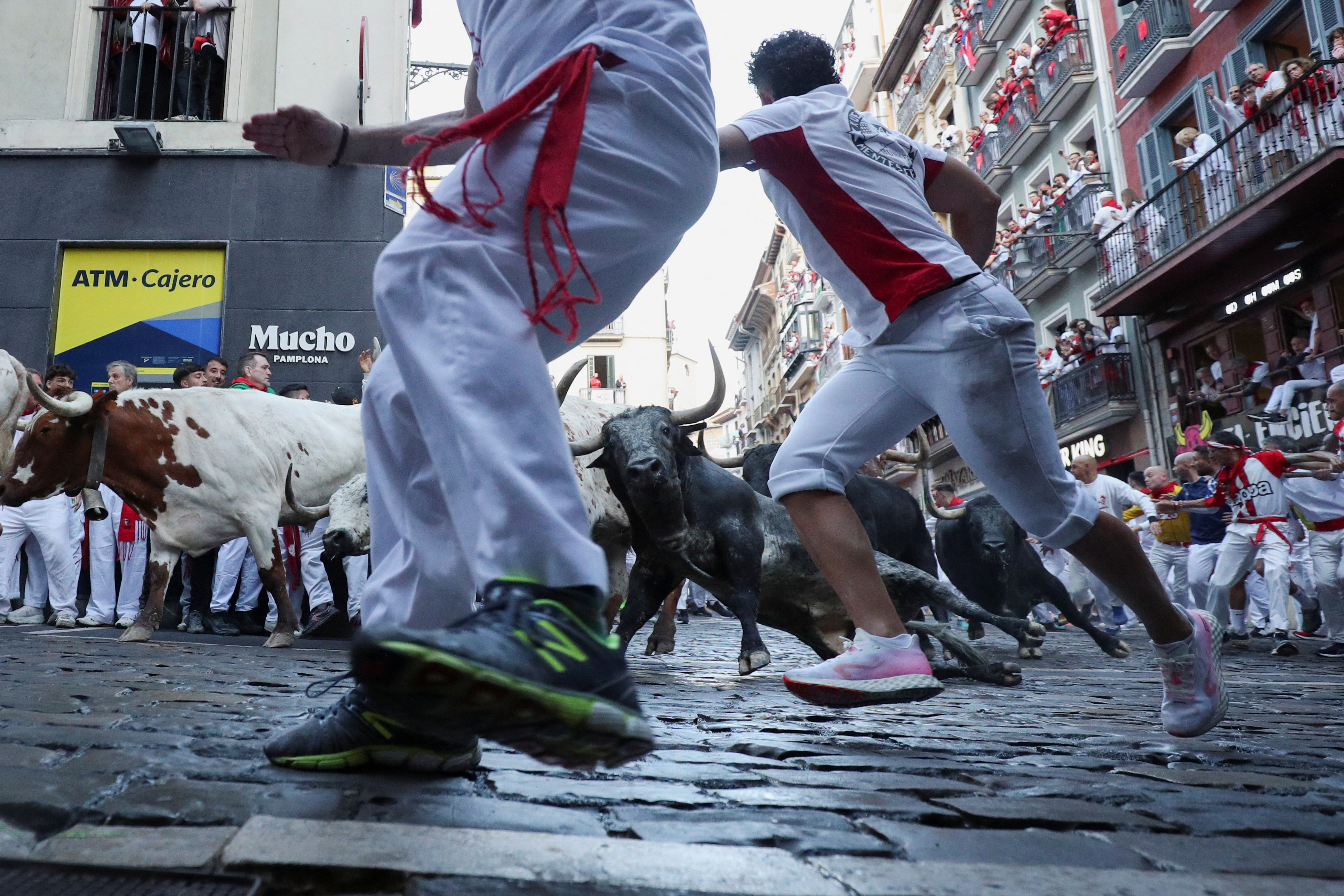 cover One man gored and seven others bruised in Spain&#8217;s bull running festival
