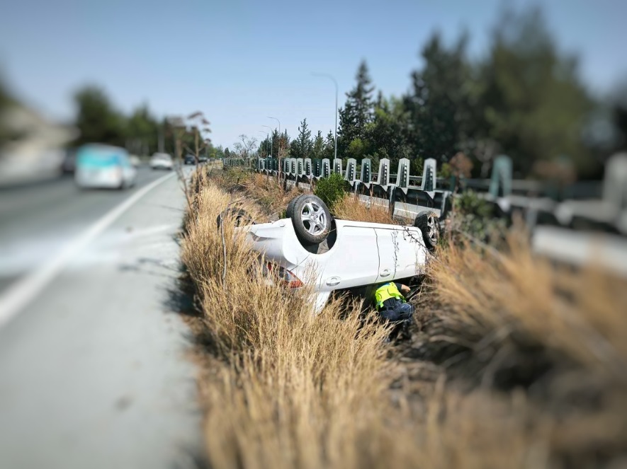 cover Two women injured as car overturns on highway