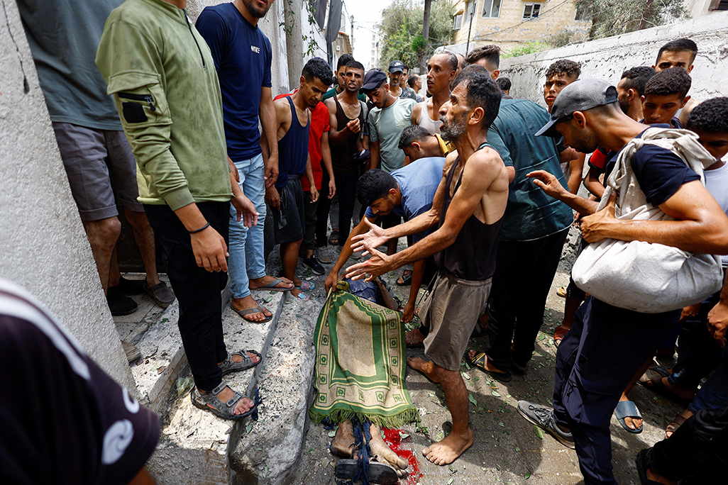 cover Israel bombards Gaza City; Hamas leader due in Cairo in bid to salvage ceasefire talks