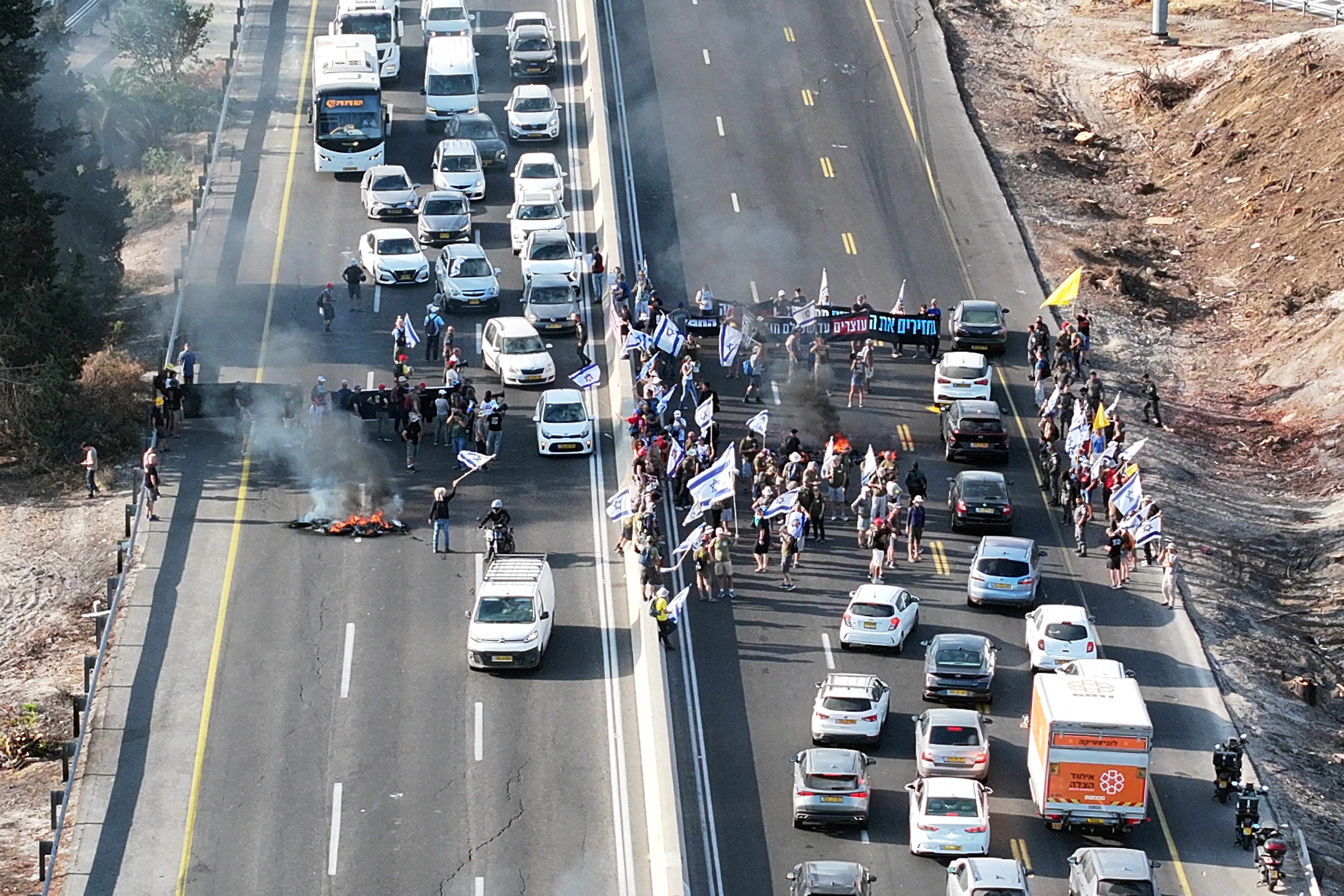 cover Israelis stage nationwide protests to demand end to Gaza war and release of hostages