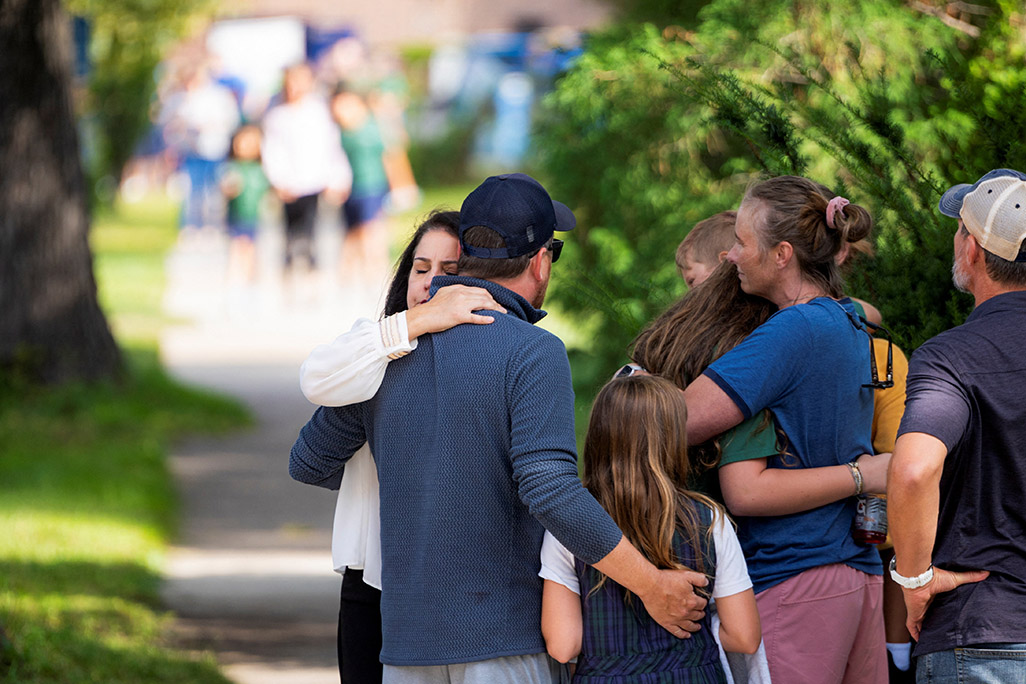 cover Three dead, 20 injured in shooting at Minneapolis Catholic school